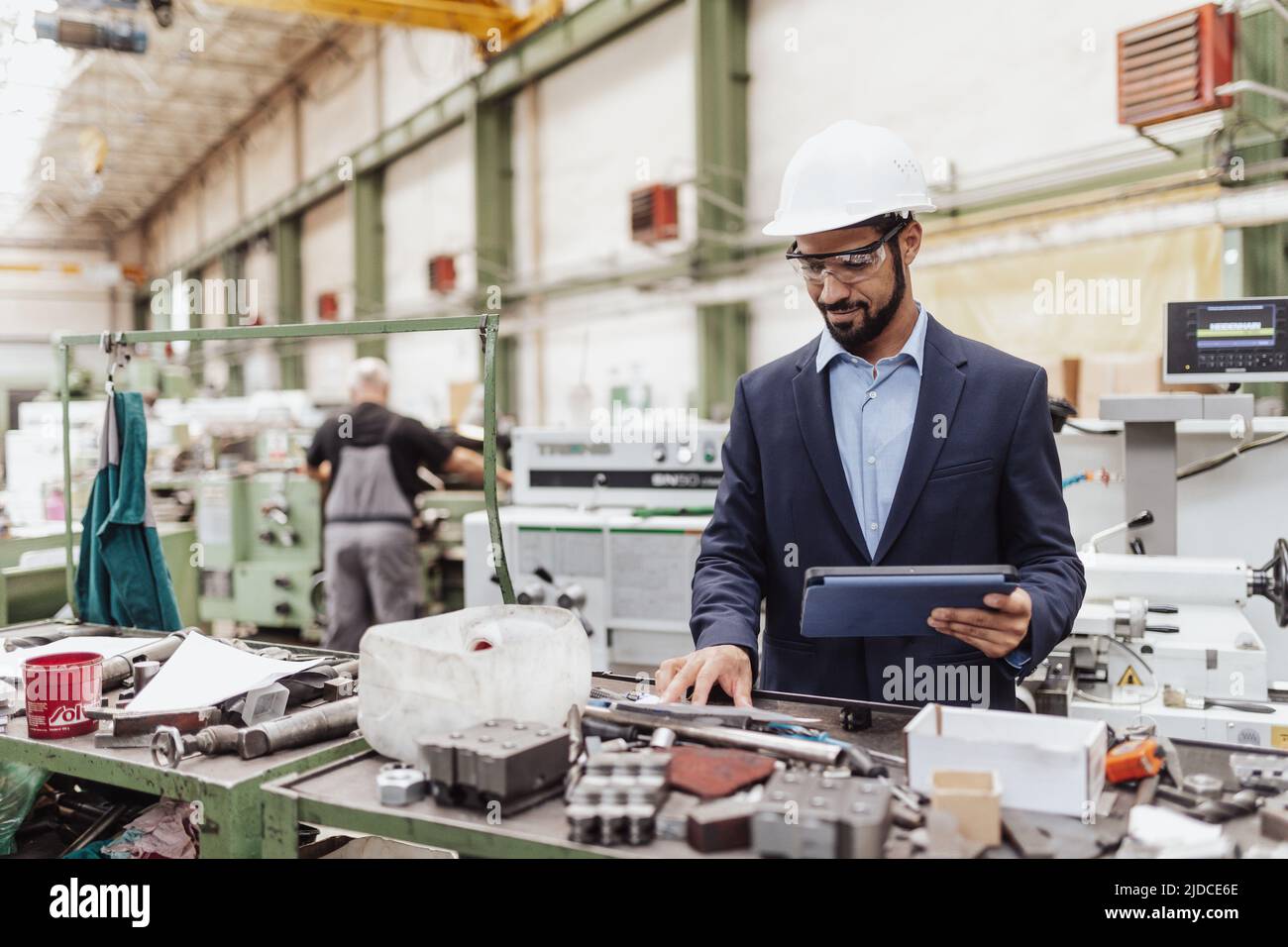 Engineering manager doing routine check up in industrial factory Stock Photo Alamy