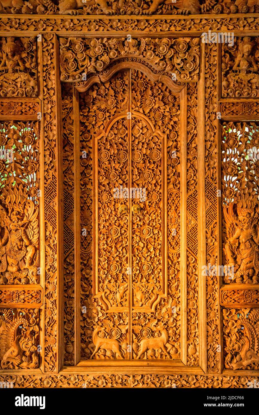 Balinese wooden carved door Stock Photo
