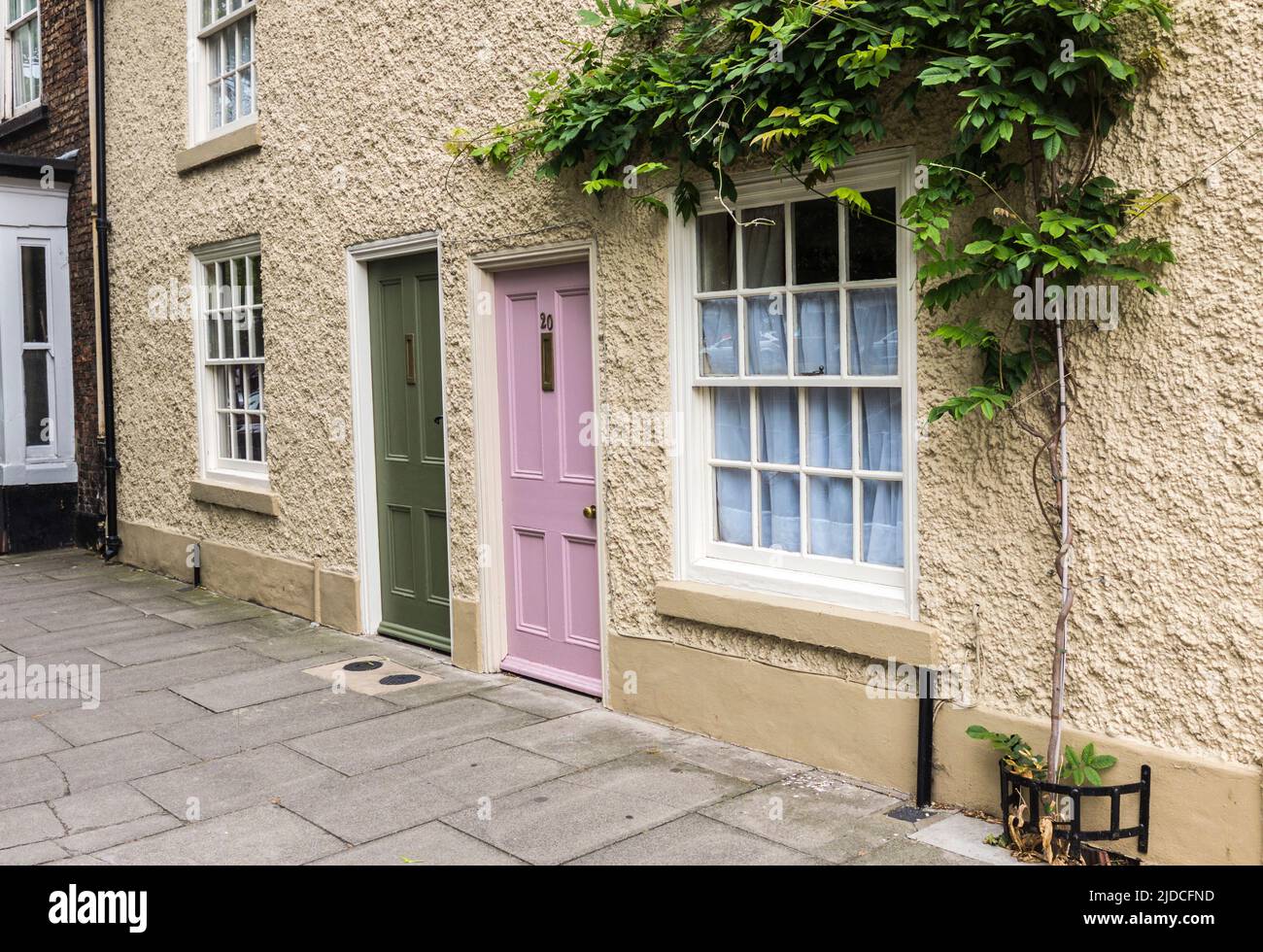 The quaint terraced houses with their pastel coloured doors on High