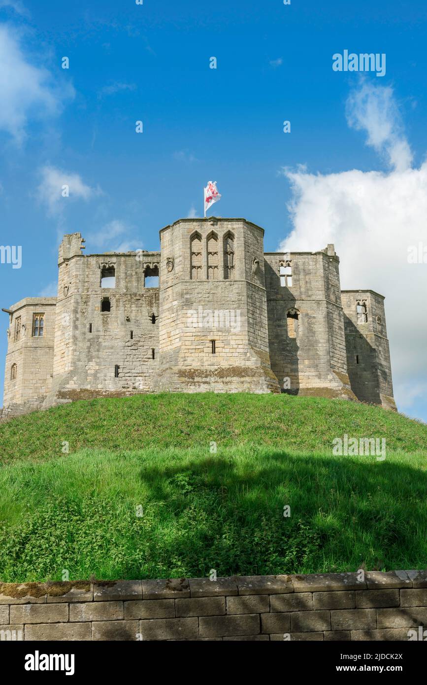 Northumberland castle, view in summer of the east wall of Warkworth Castle sited in the centre of Warkworth town, Northumberland coast, England, UK Stock Photo