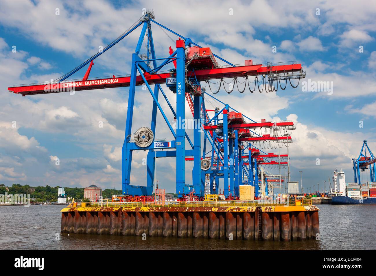 Hamburg, Germany - July 12, 2011 : Container Terminal Burchardkai  at Hamburg Harbor. Industry for loading and unloading cargo transport ships. Stock Photo