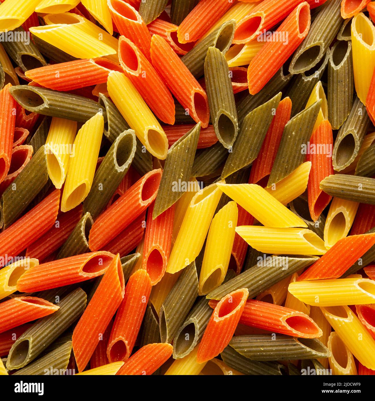 Durum Wheat Semolina Pasta with Tomato and Spinach. Tri-color Penne