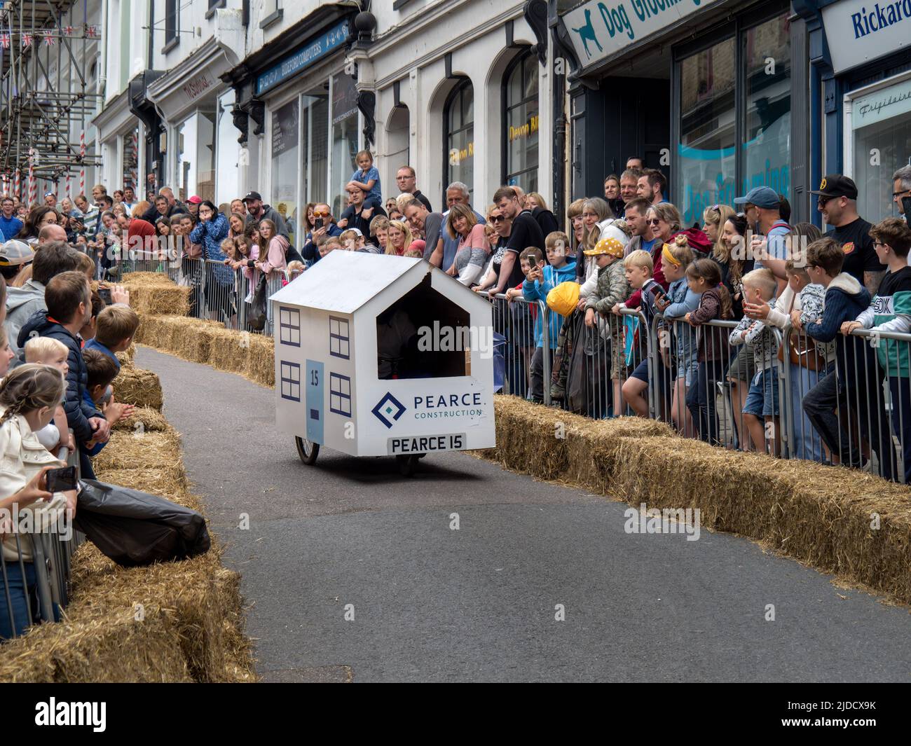 BIDEFORD, NORTH DEVON, ENGLAND - JUNE 19 2022: Participants in the annual Soap Box Derby, fundraising for charity Chemohero. House. Stock Photo