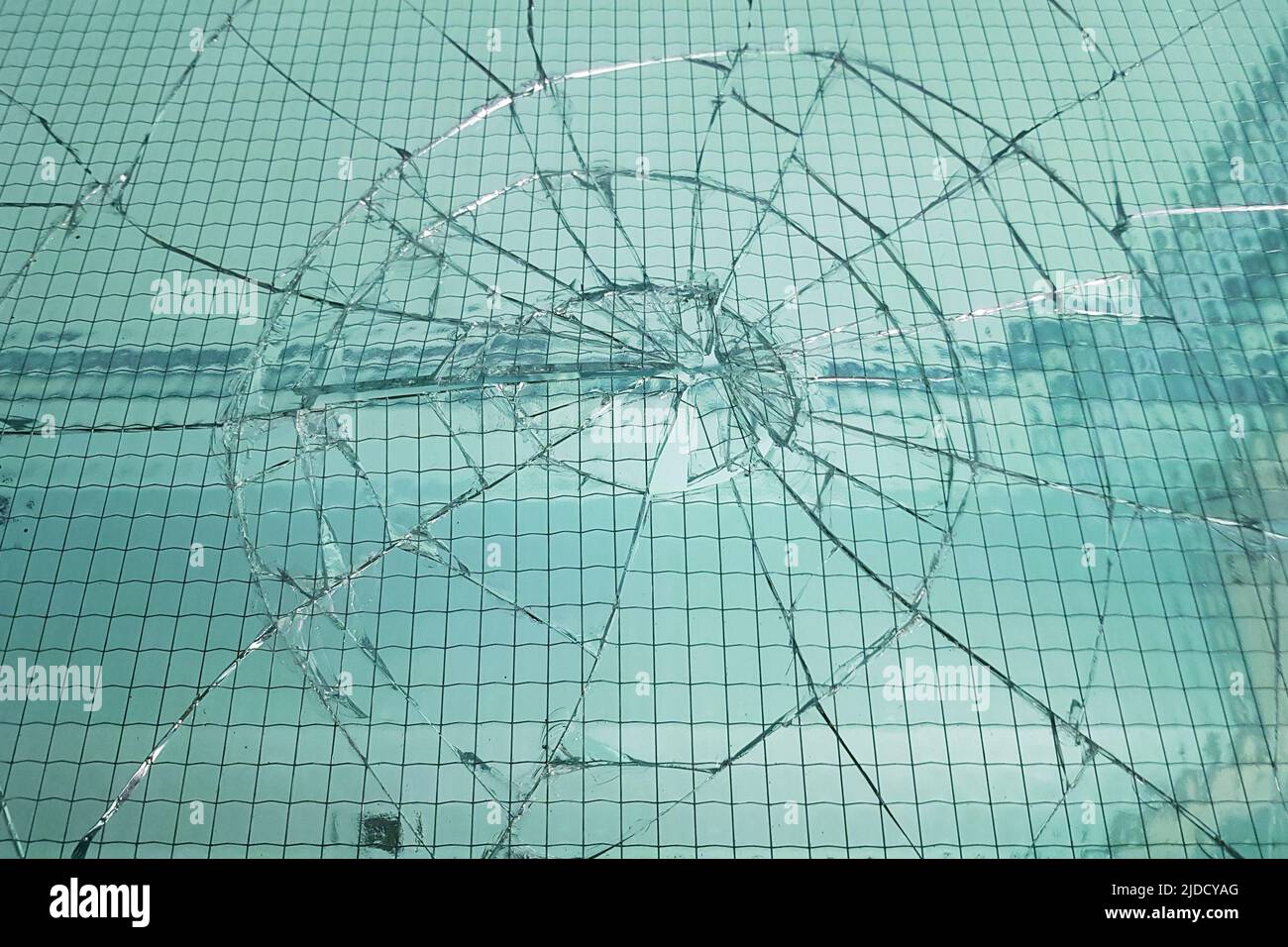 Broken window background. Cracked glass texture Stock Photo