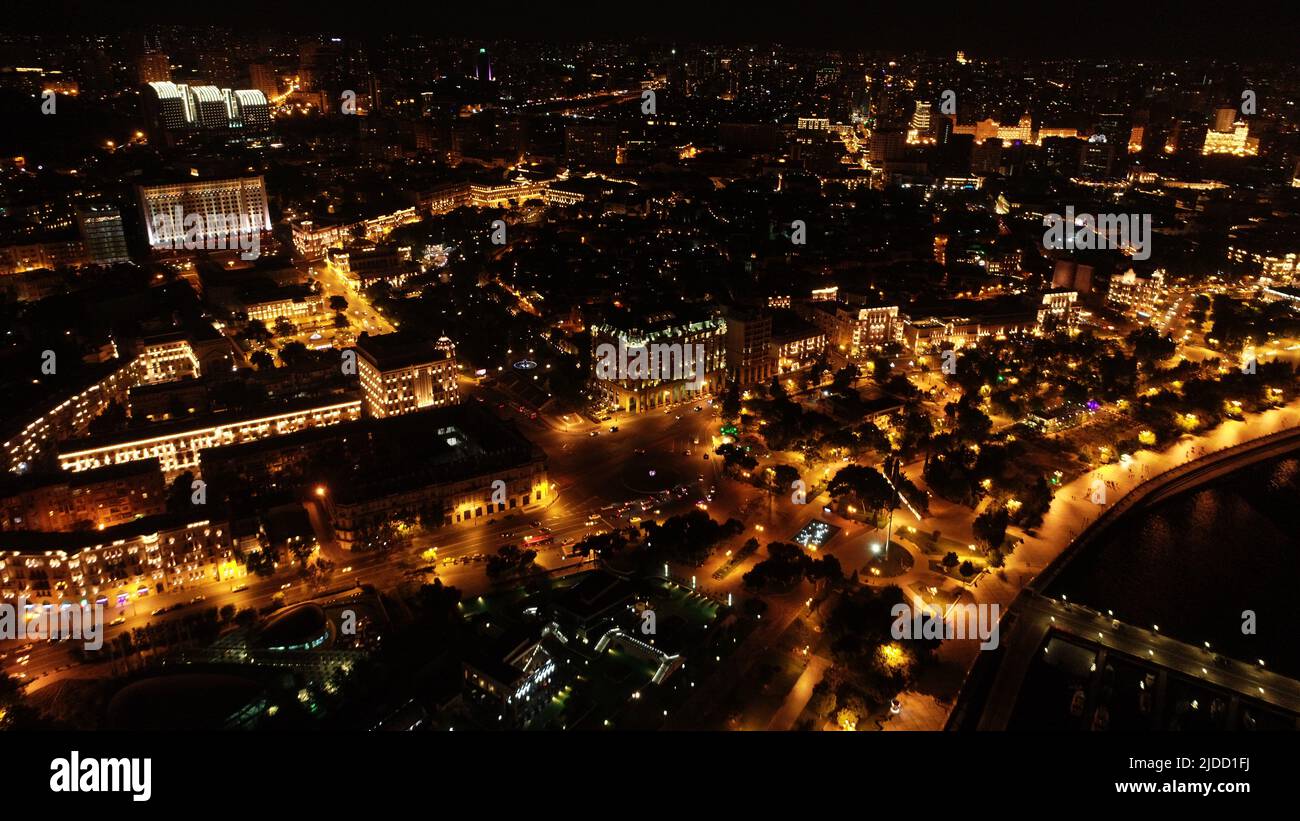 Night view of the City of Baku Boulevard with yellow lights, skyline drone aerial top view, Azerbaijan, Southern Caucasus Stock Photo