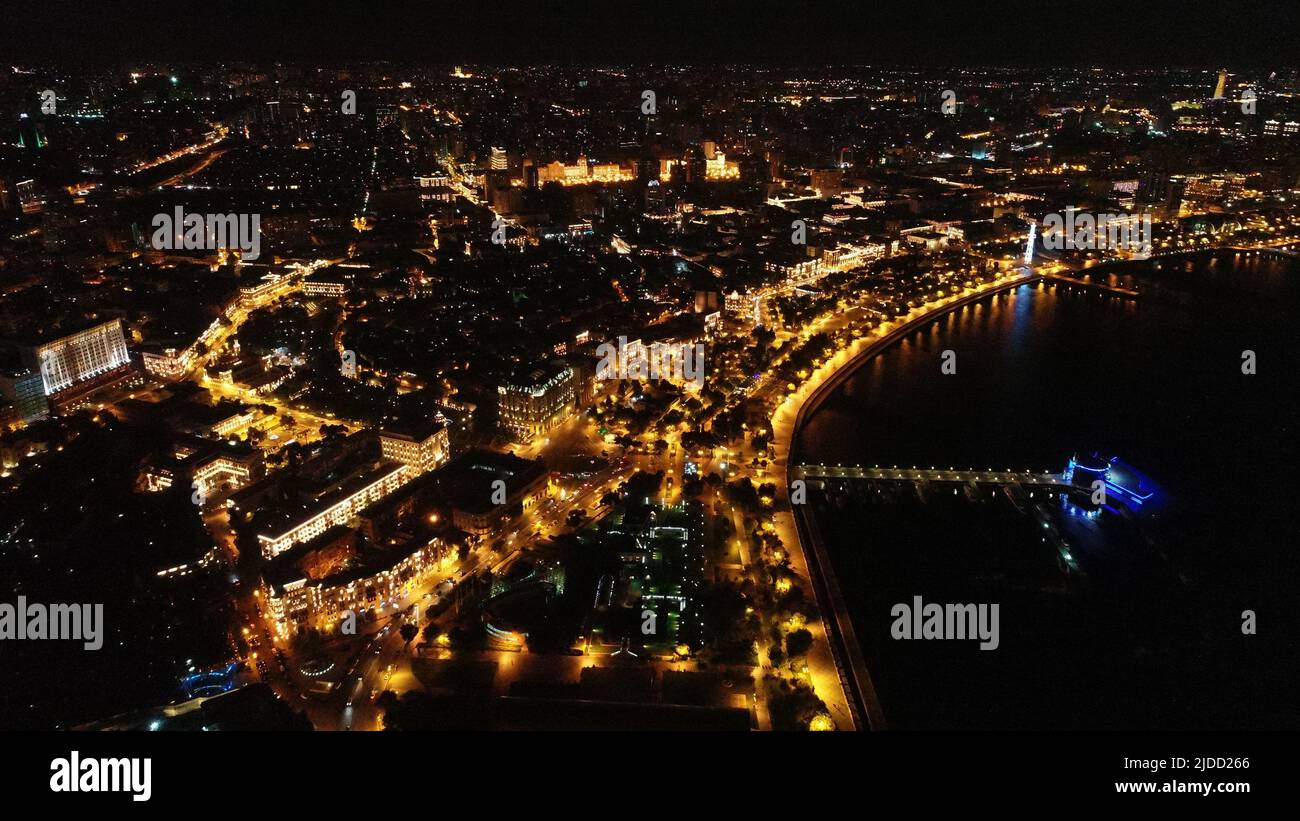 Night view of the City of Baku Boulevard with yellow lights, skyline drone aerial top view, Azerbaijan, Southern Caucasus Stock Photo