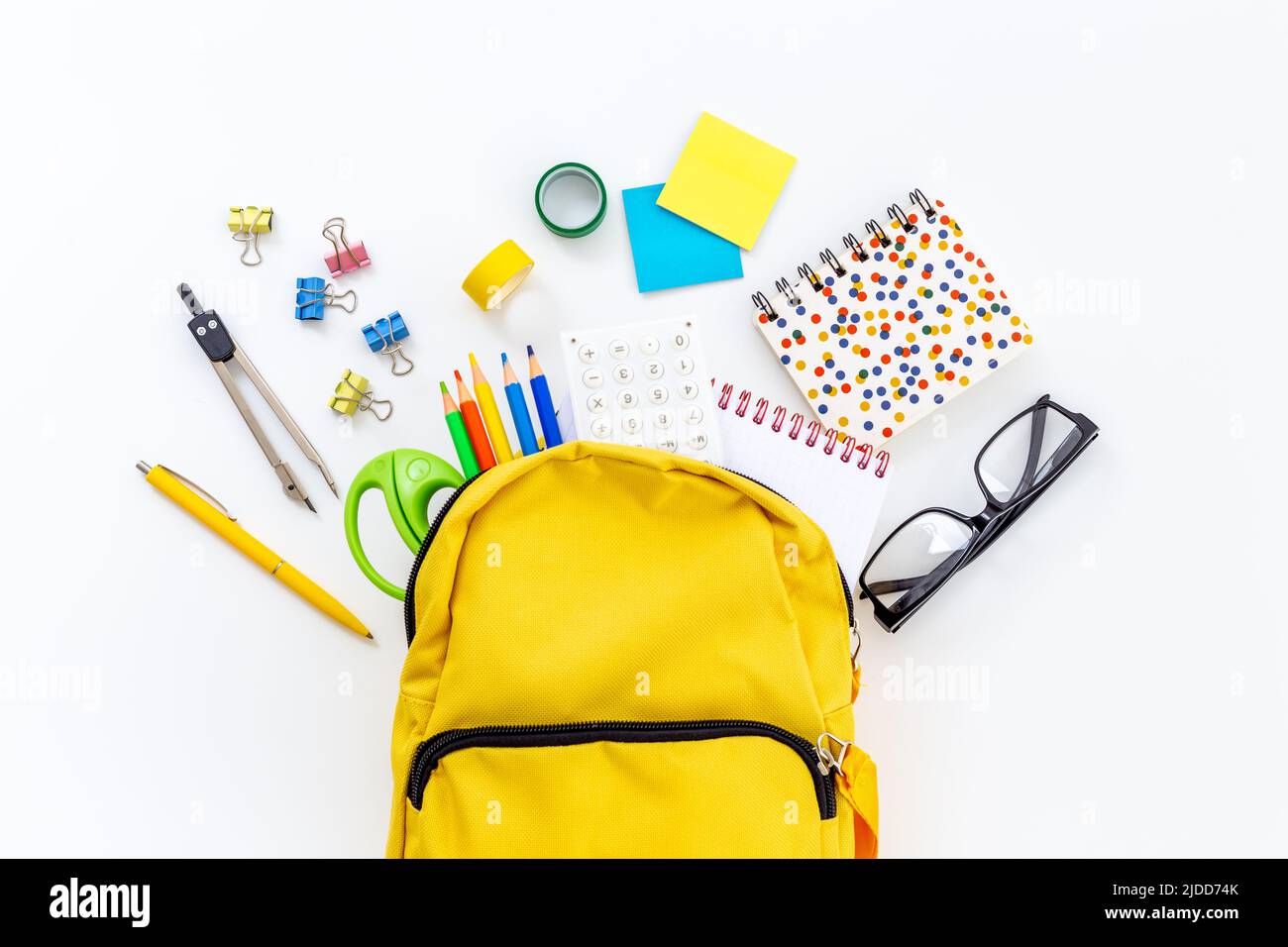 School backpack with school items and students equipment, top view Stock Photo