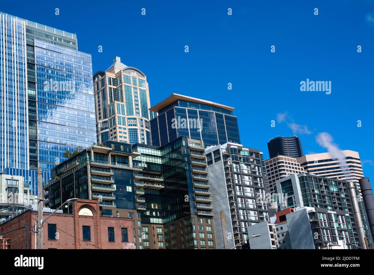 View of skyline with modern buildings seen from Downtown Seattle Washington Stock Photo