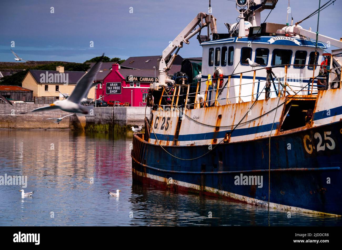 Traditional fishing trawler in the port of Kilonan on the Aran Island