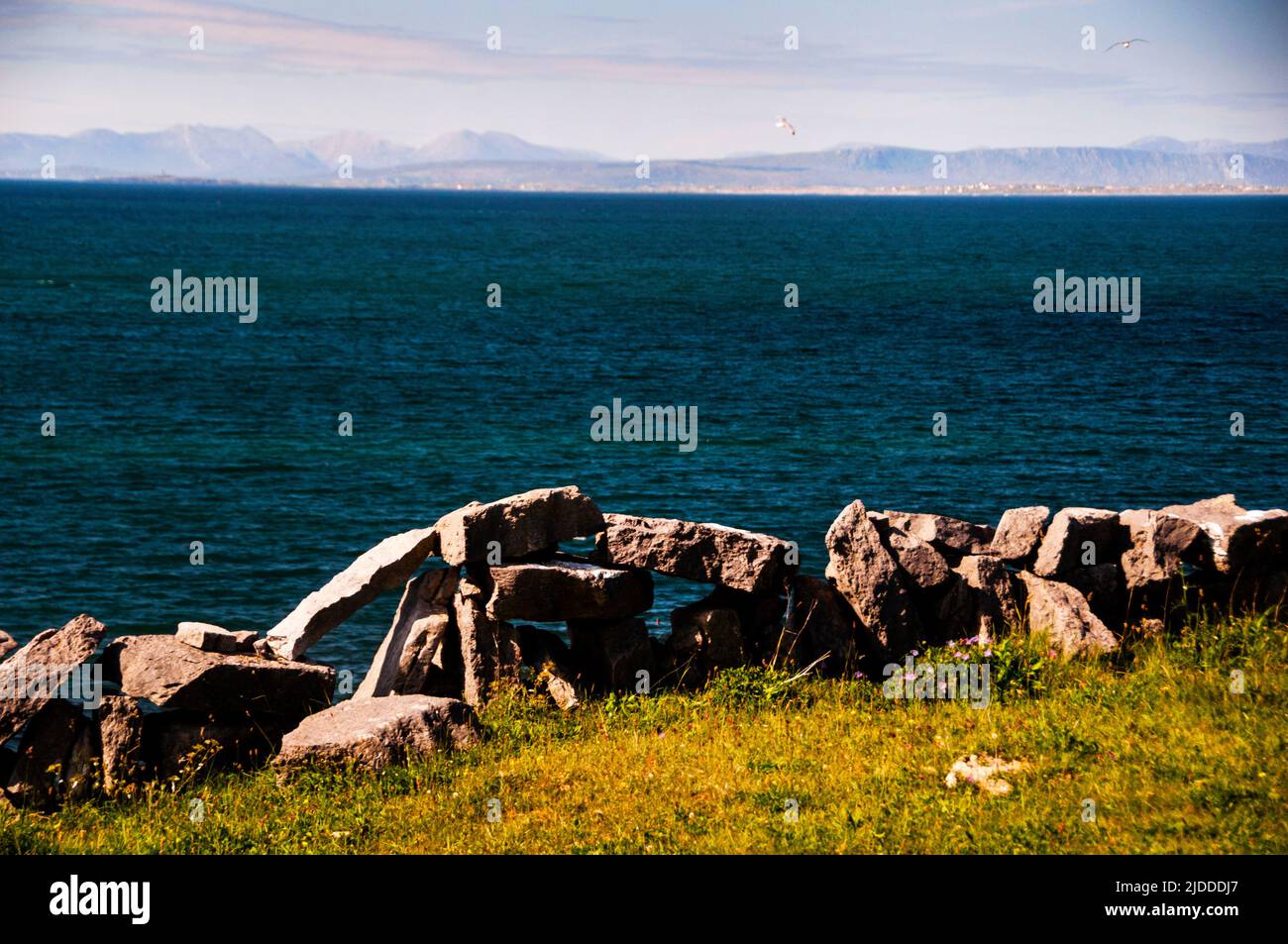 Ireland Bay Rocks Ubiquitously charming Irish rock wall and Galway Bay from the Aran ...