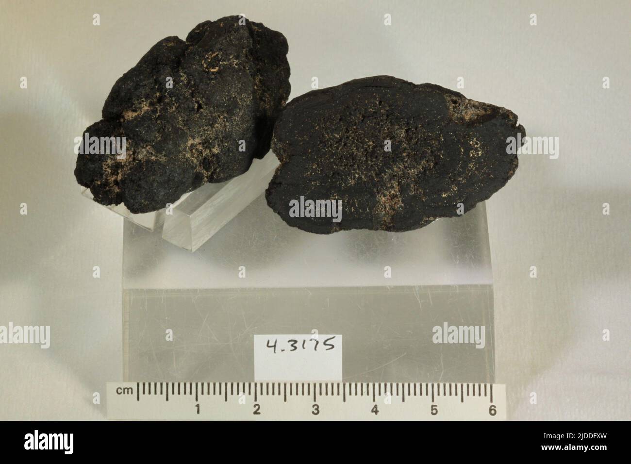 Manganese nodule. minerals. Pacific Ocean, 3 mile depth, 1000 mi W of Mexico and S of Hawaii Stock Photo