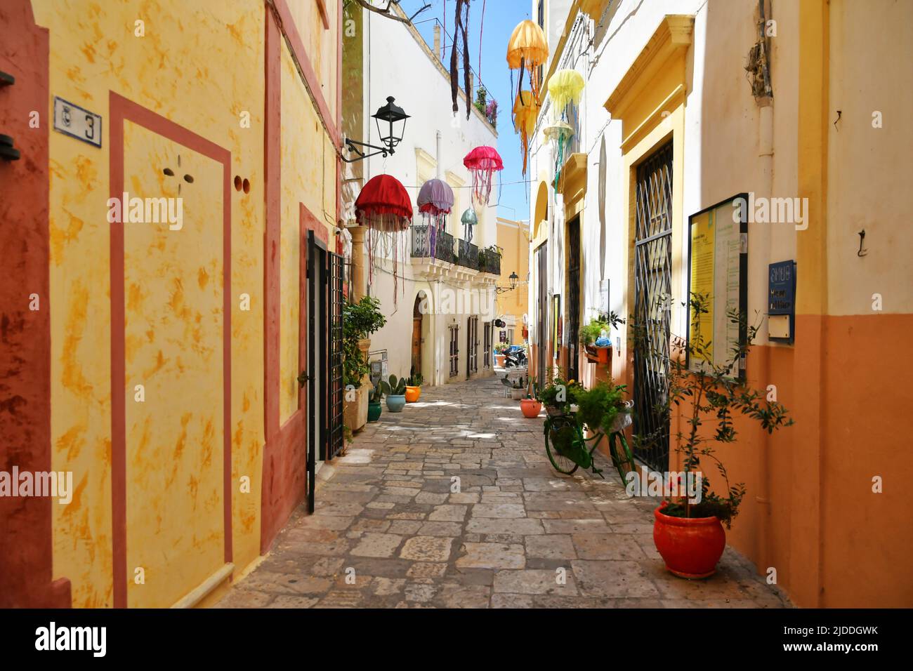 A narrow street between the old houses of Gallipoli, an old village in