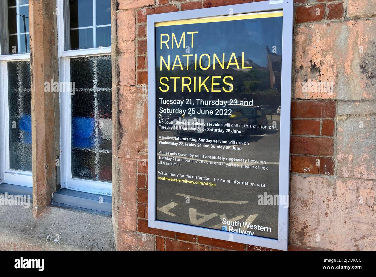 Axminster, Devon, UK.  20th June 2022.  RMT Rail Strike: RMT National Strike poster at the entrance to the railway station at Axminster in Devon on the London Waterloo to Exeter line served by South Western Railways which will have no trains on Tuesday 21st, Thursday 23rd and Saturday 25th June 2022 due to the rail strike by the RMT Union.  Picture Credit: Graham Hunt/Alamy Live News Stock Photo