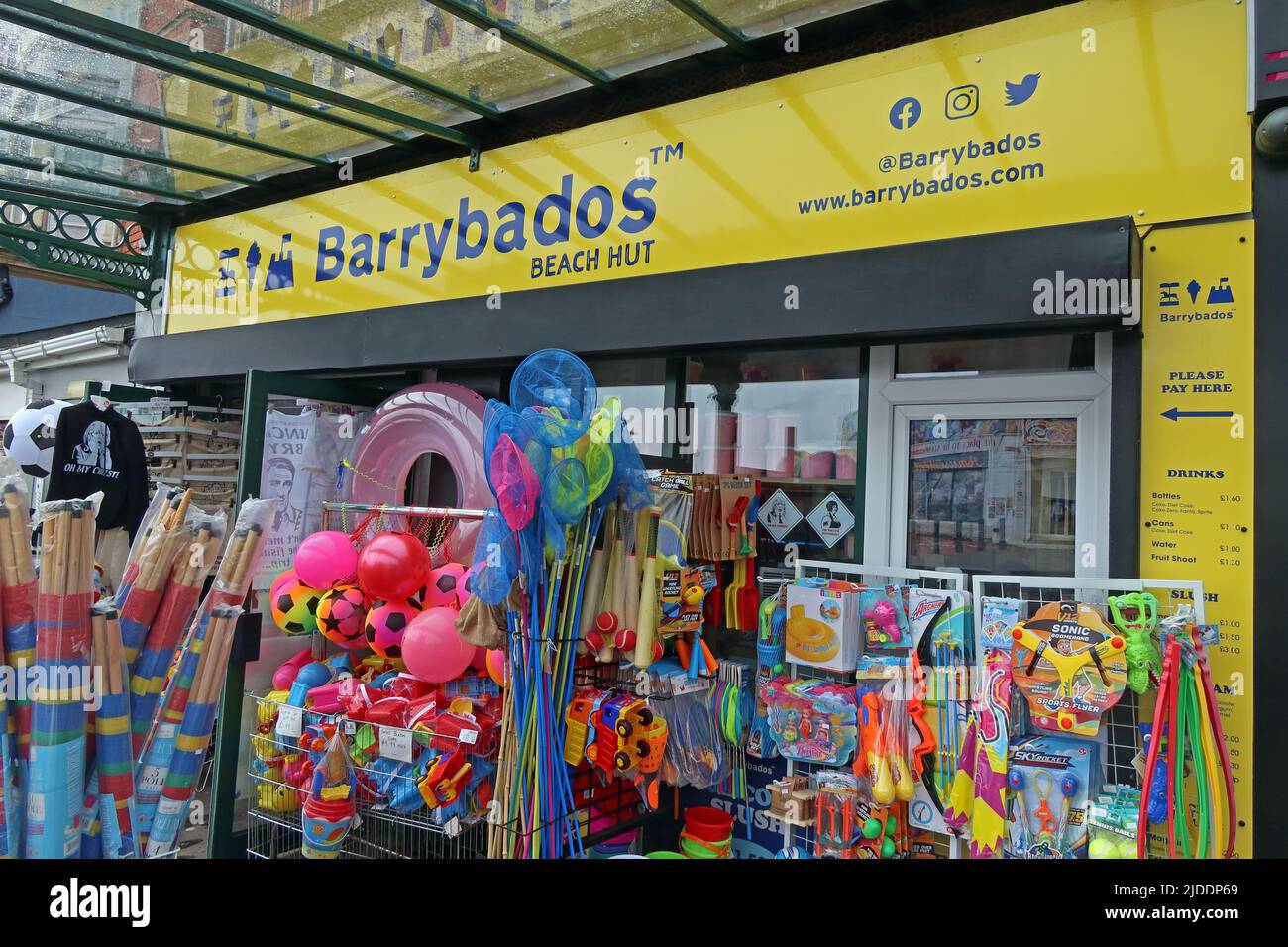 The yellow Barrybados beach hut shop, 1 Paget Rd, Barry, Cardiff, Vale Of Glamorgan, Wales, UK,   CF62 5TQ Stock Photo