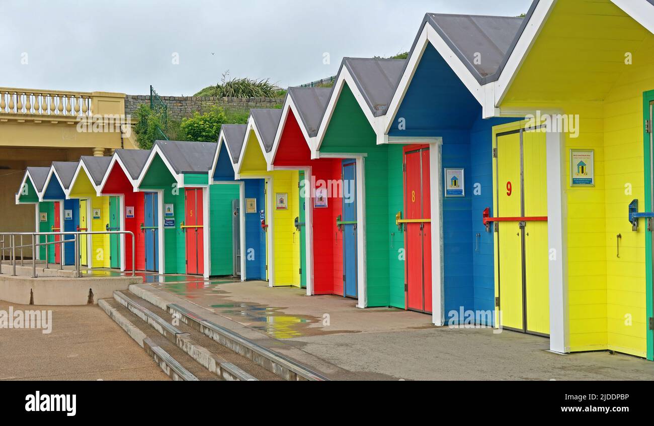 Multicoloured Barry Island beach huts for hire / rent , Barry, looking over Whitmore Bay, Vale Of Glamorgan, Wales, Cymru, UK, CF62 5DA Stock Photo