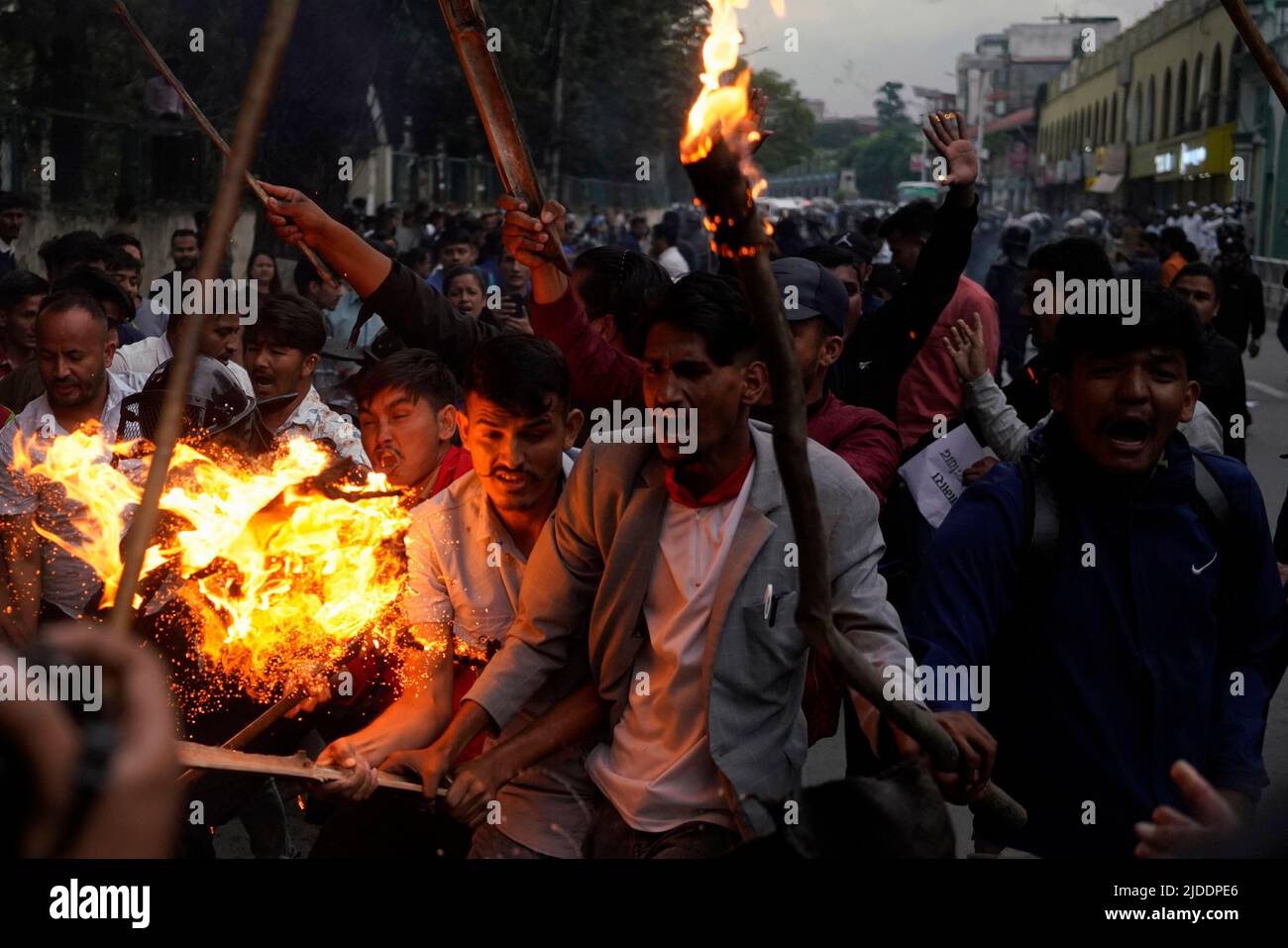 Kathmandu, Nepal. 20th June, 2022. Student protesters clash with Riot and Armed Police forces during a protest against the hike in fuel prices, which increased by Rs 21 in a litre of petrol and Rs 27 in a hike in kerosene and diesel, an all-time record high cost of gasoline, diesel, and kerosene with the new price near Rs 200 in Kathmandu, Nepal on Monday, June 20, 2022. (Credit Image: © Skanda Gautam/ZUMA Press Wire) Stock Photo