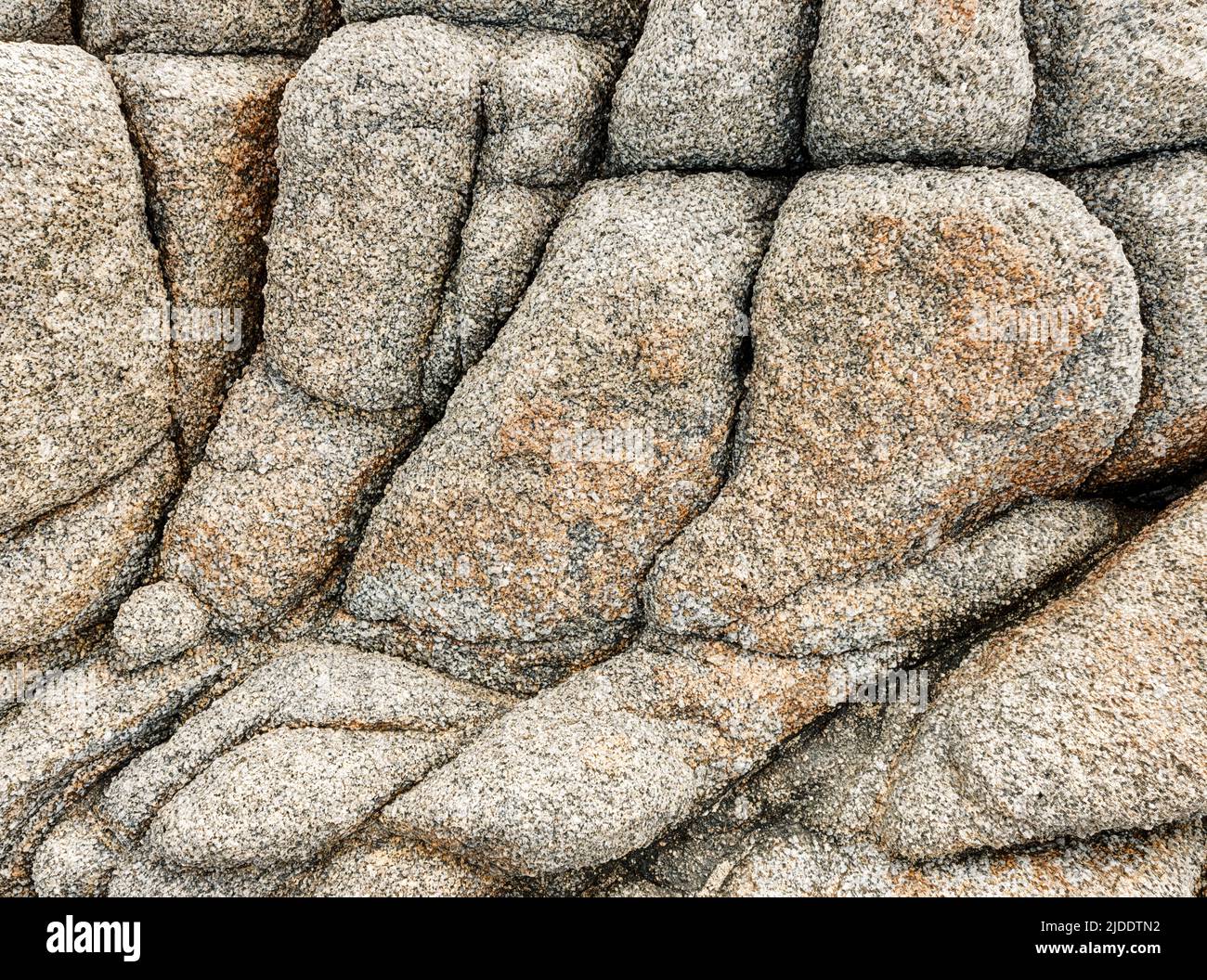 Granite boulders near Ajaccio, in Corsica, are arranged in a natural pattern. Stock Photo