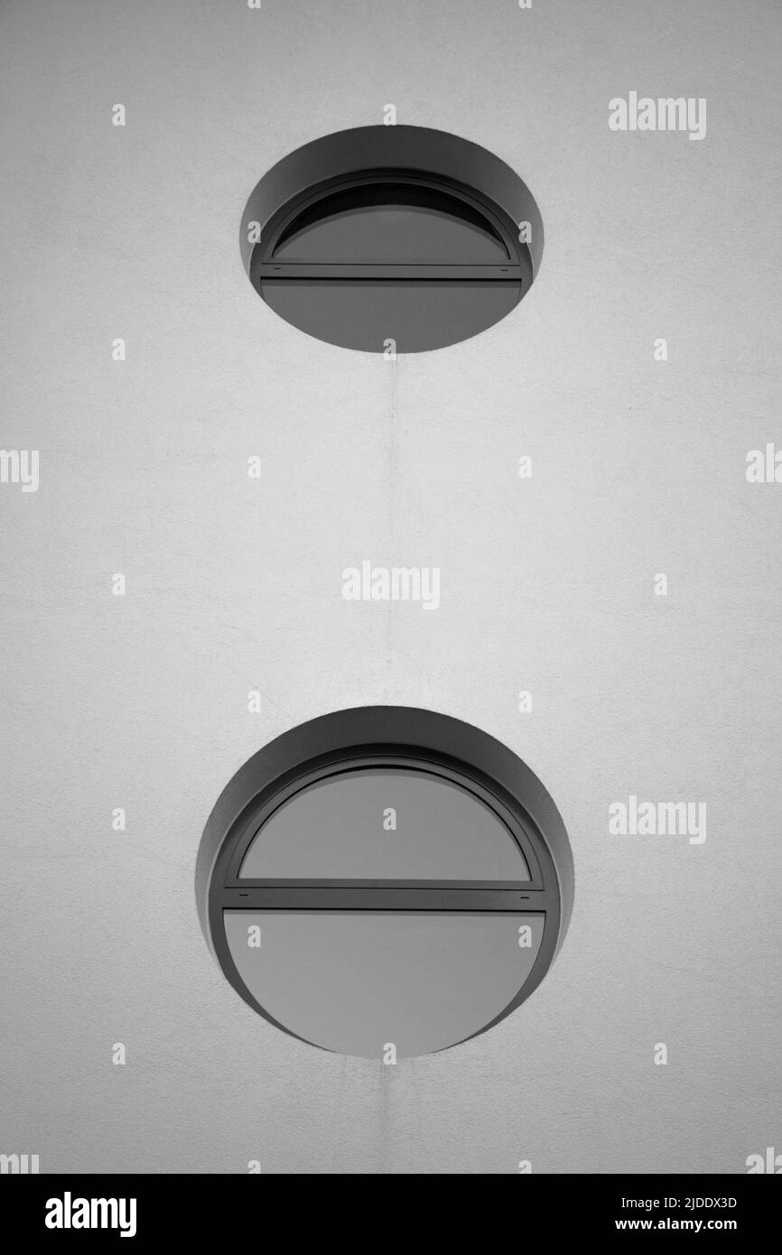 Clean White round window in black and white Stock Photo