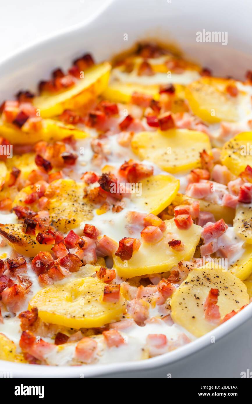 baked potatoes with bacon and eggs Stock Photo - Alamy