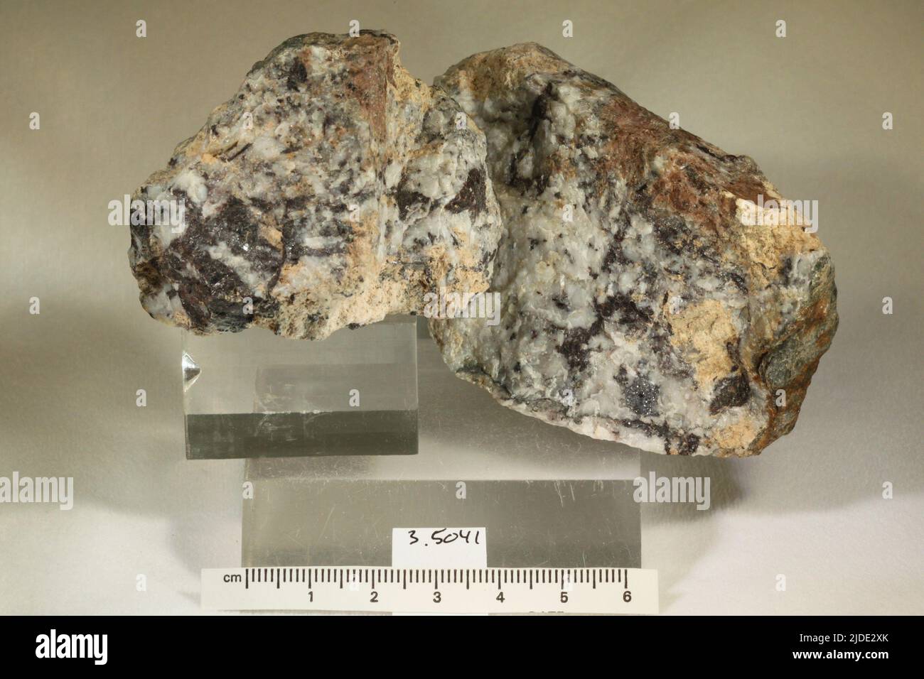 Hubnerite. minerals. North America; USA; Idaho; Valley County; Big Creek; Red Blue Buff Mine Stock Photo