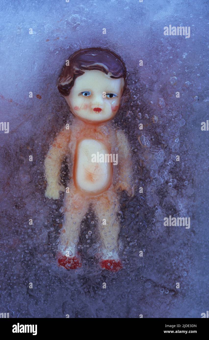 Girl Doll Lying Face Upwards In Ice And Surrounded By Blood Stock Photo - Alamy