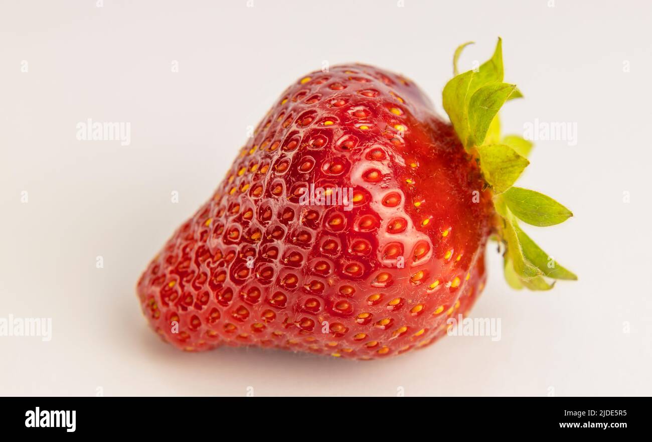 Strawberries isolated on white background, close up Stock Photo - Alamy