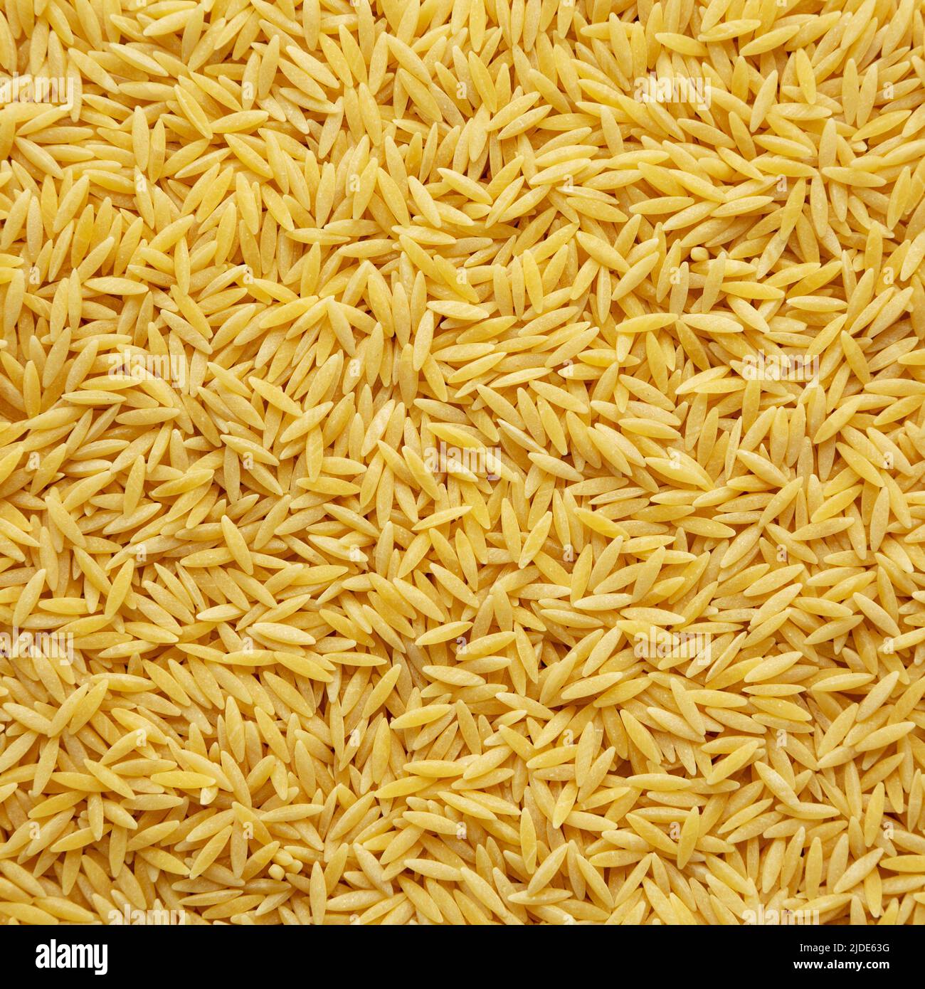 Raw Organic Risoni Pasta Background Stock Photo - Alamy