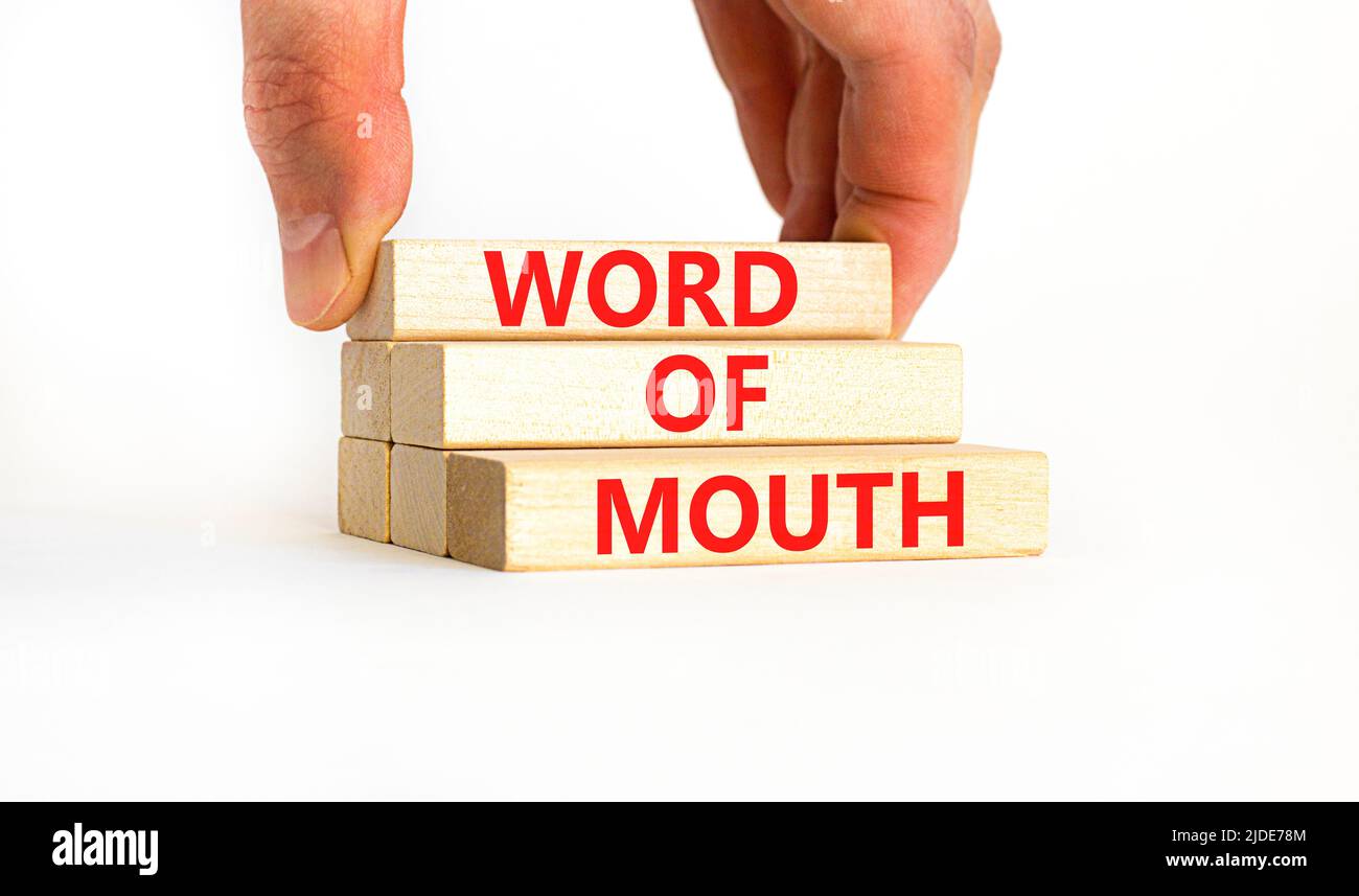 Word of mouth symbol. Concept words Word of mouth on wooden blocks on a ...