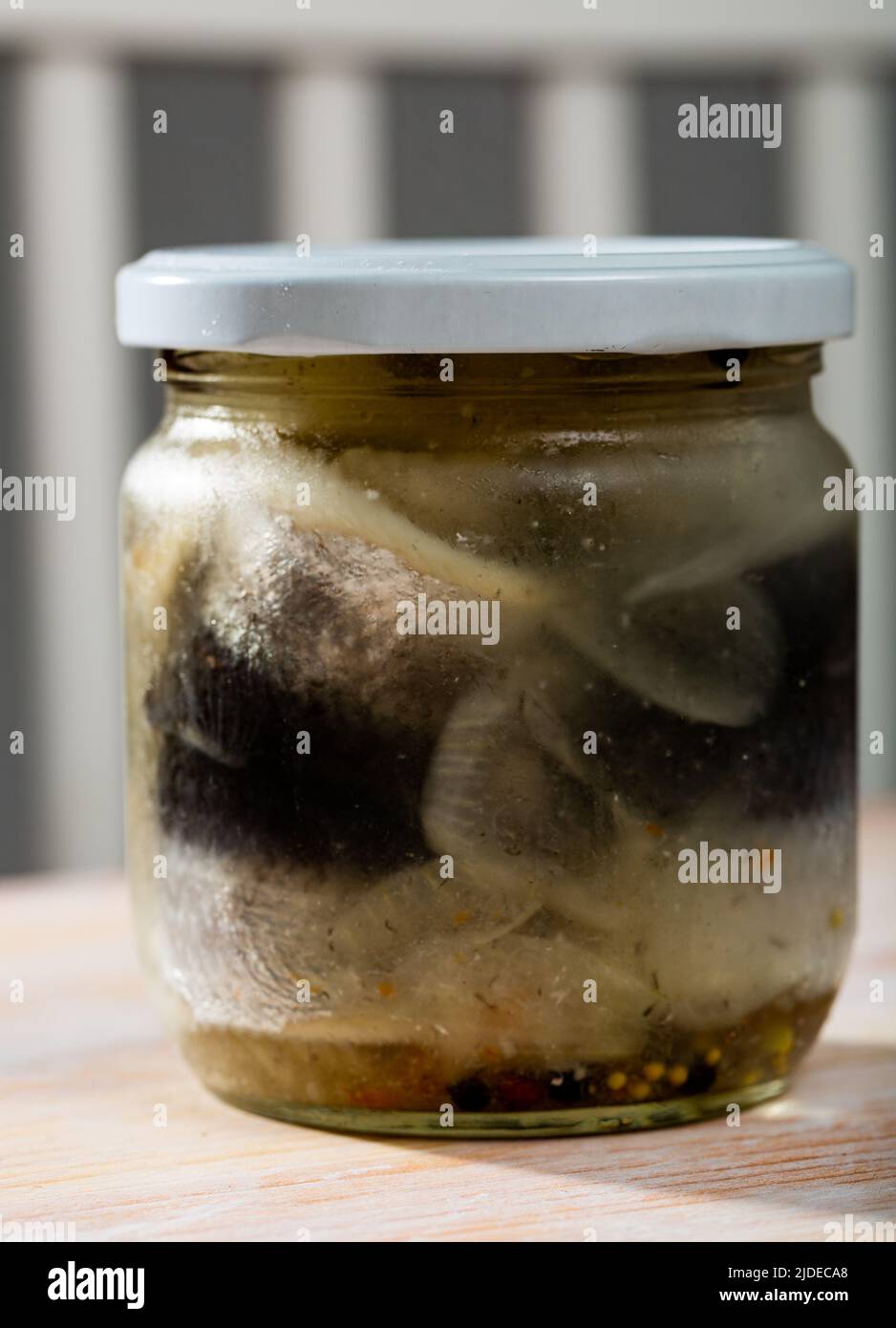 Glass jar with pickled herring Stock Photo Alamy