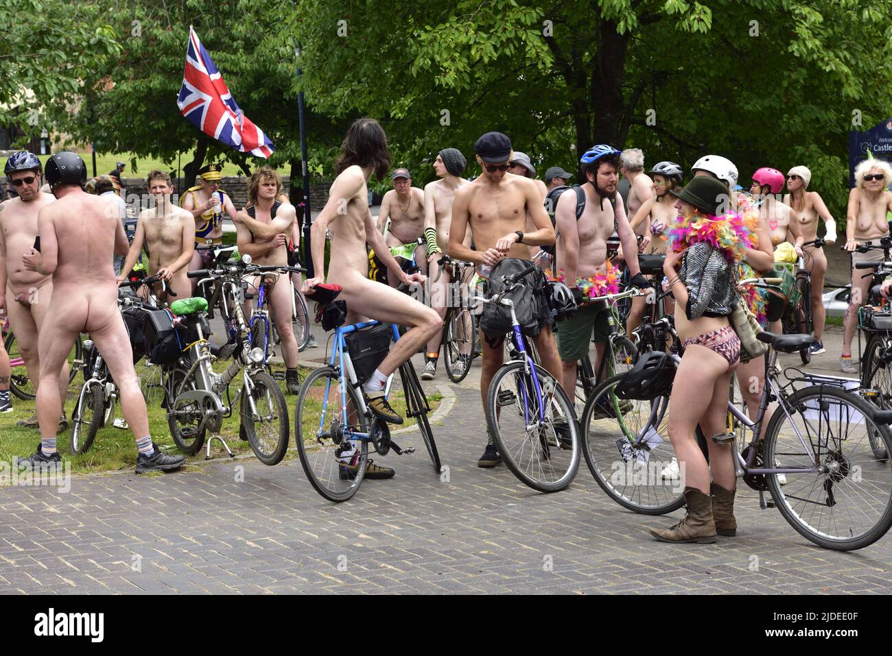 Participants in World Naked Bike Ride in Bristol 2022 during rest stop at Castle Park, Bristol, UK Stock Photo