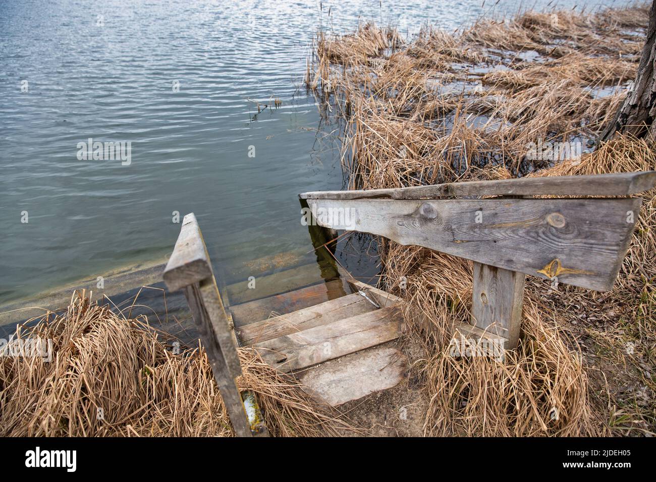 old wooden swimming ladder on Virlya lake closeup. Velyki Berezhtsi, Kremenets, Ternopil region, Ukraine. Stock Photo