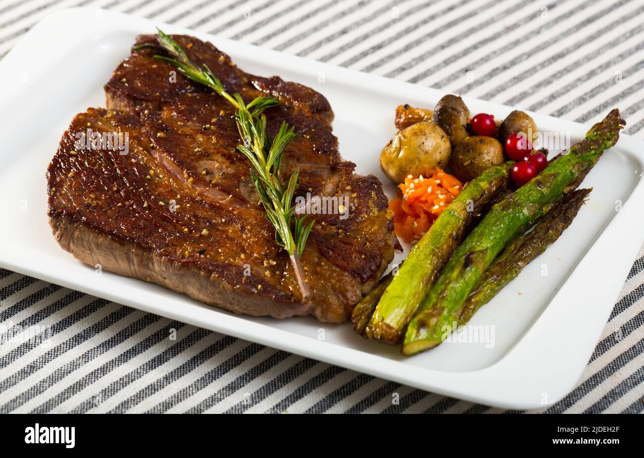 Grilled veal loin with baked vegetables Stock Photo Alamy