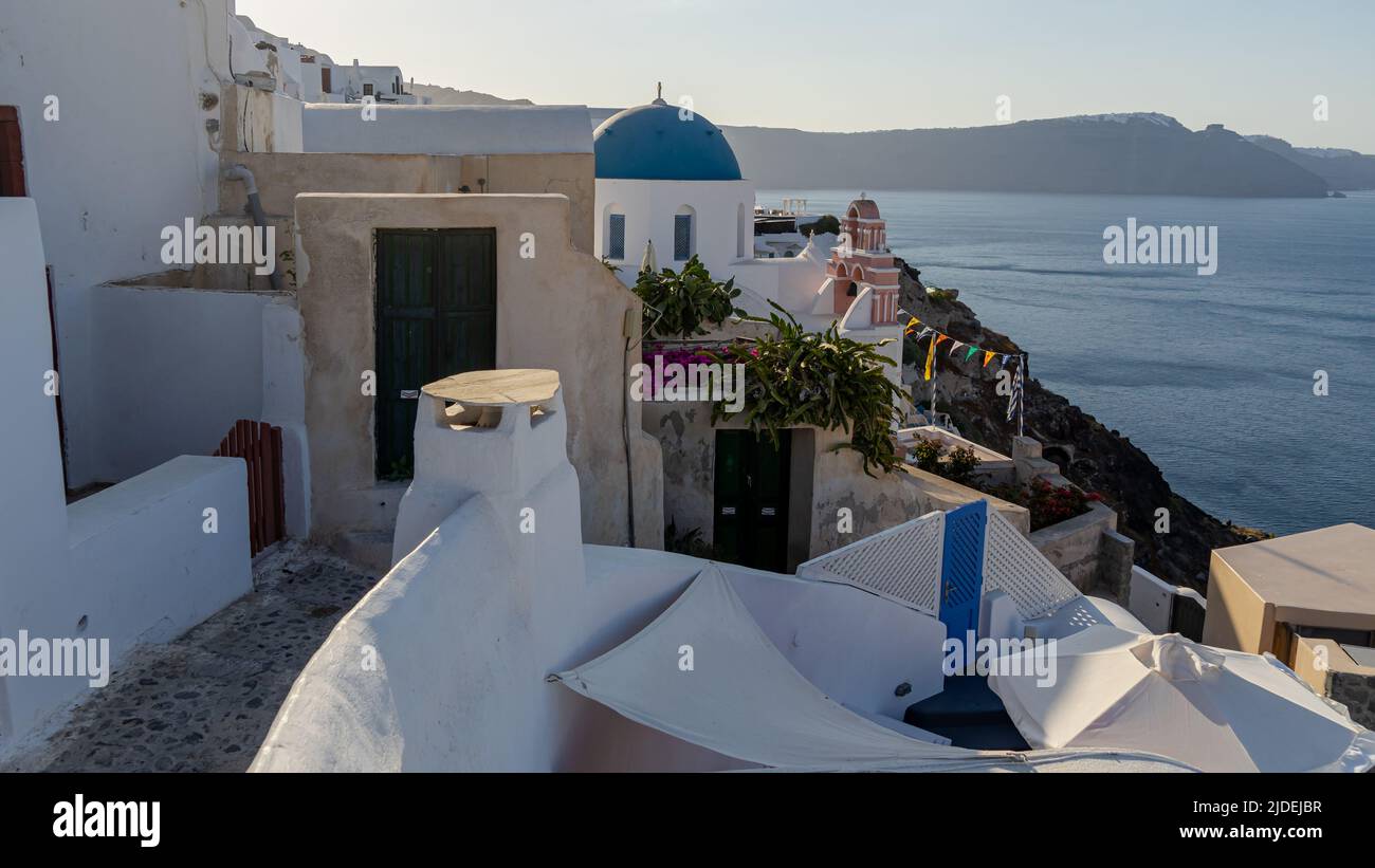 Early morning light over empty streets in Oia Stock Photo