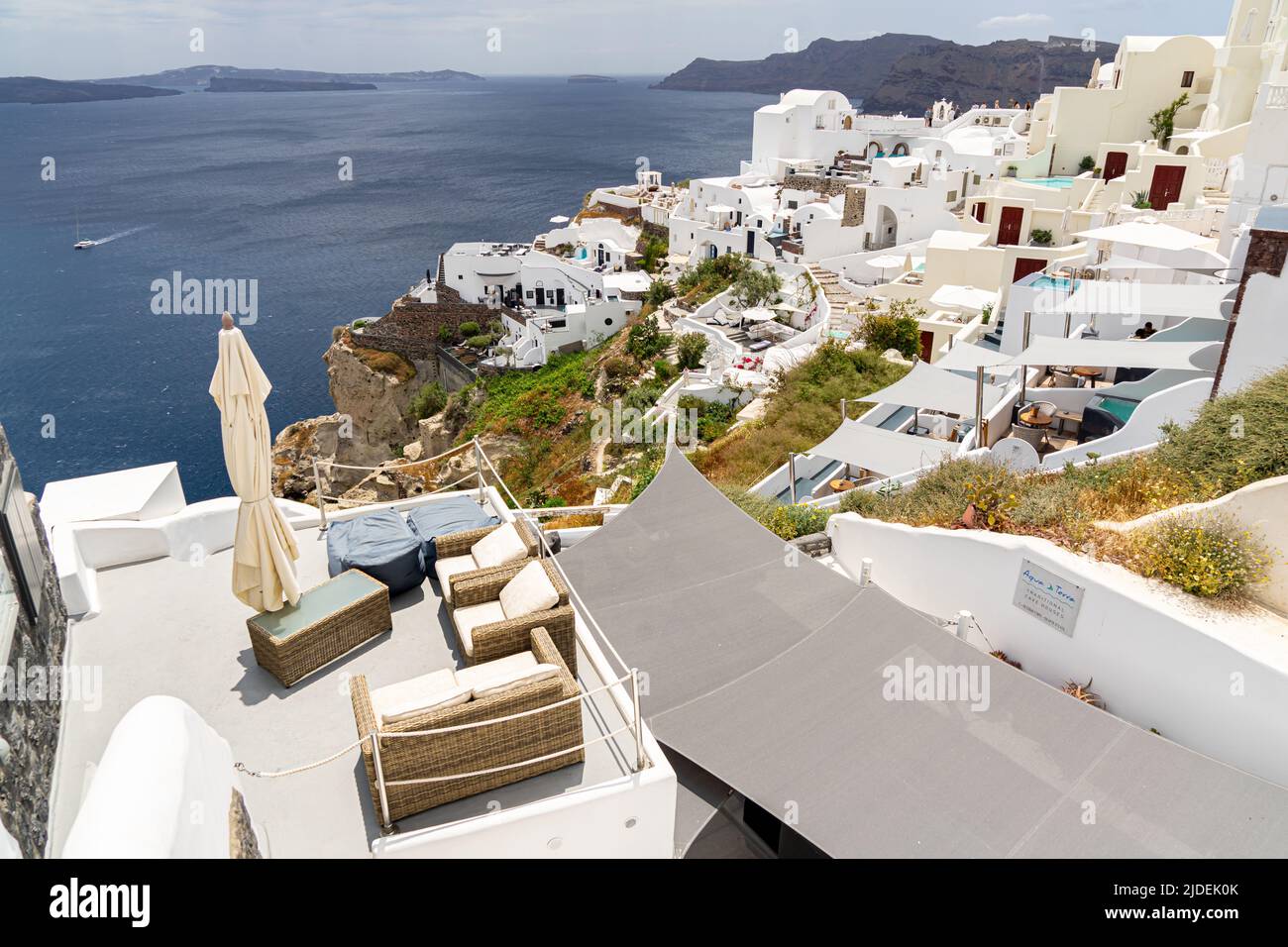View over a sunny patio at Oia Stock Photo
