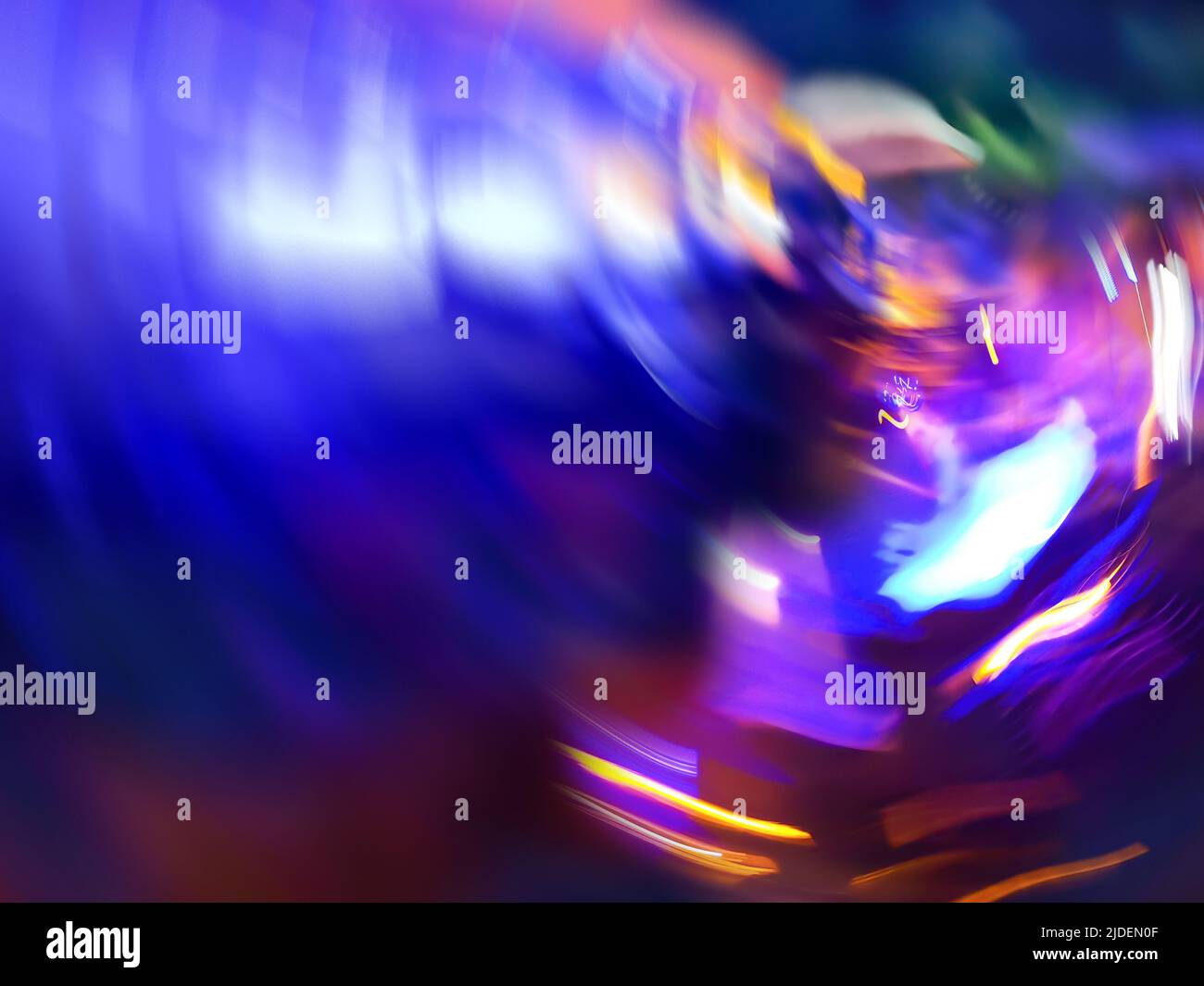 Colorful abstract dynamic defocused light trails. Sphere decorative backdrop with sparks flying. Stock Photo