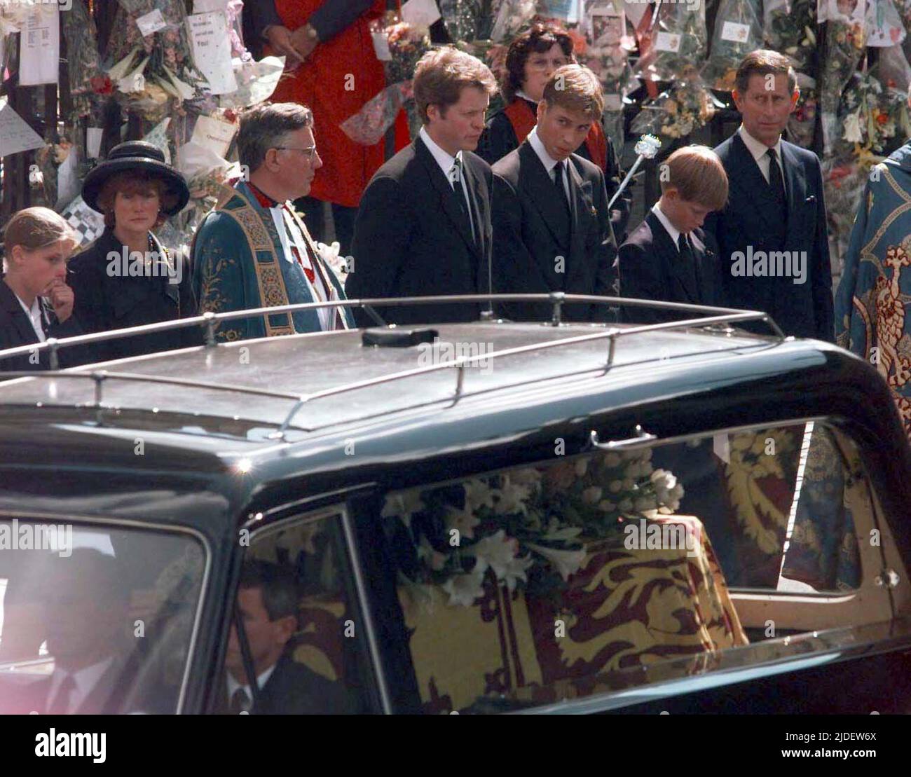 File photo dated 6/9/1997 of Earl Spencer (4th left) Prince William, Prince Harry and The Prince of Wales (far right) watch the coffin of Diana, Princess of Wales, leave Westminster Abbey following her funeral. The Duke of Cambridge celebrates his 40th birthday on Tuesday. Issue date: Monday June 20, 2022. Stock Photo