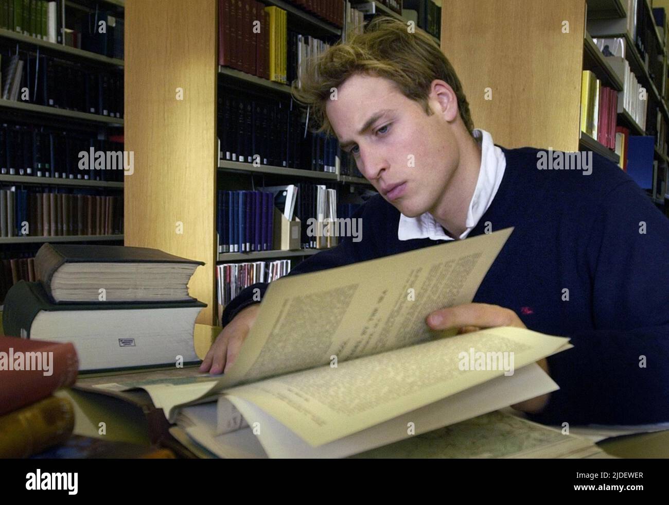 File photo dated 15/11/2004 of Prince William studies in the main university library, at St Andrews where he is a student. The Duke of Cambridge celebrates his 40th birthday on Tuesday. Issue date: Monday June 20, 2022. Stock Photo