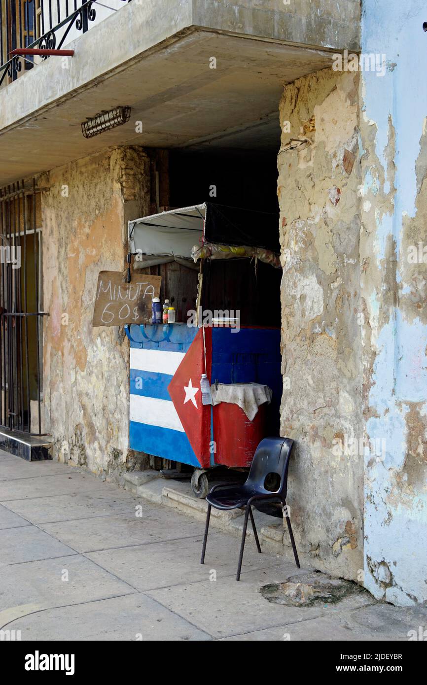 cuban flag at a small food shop in the streets of cardenas Stock Photo