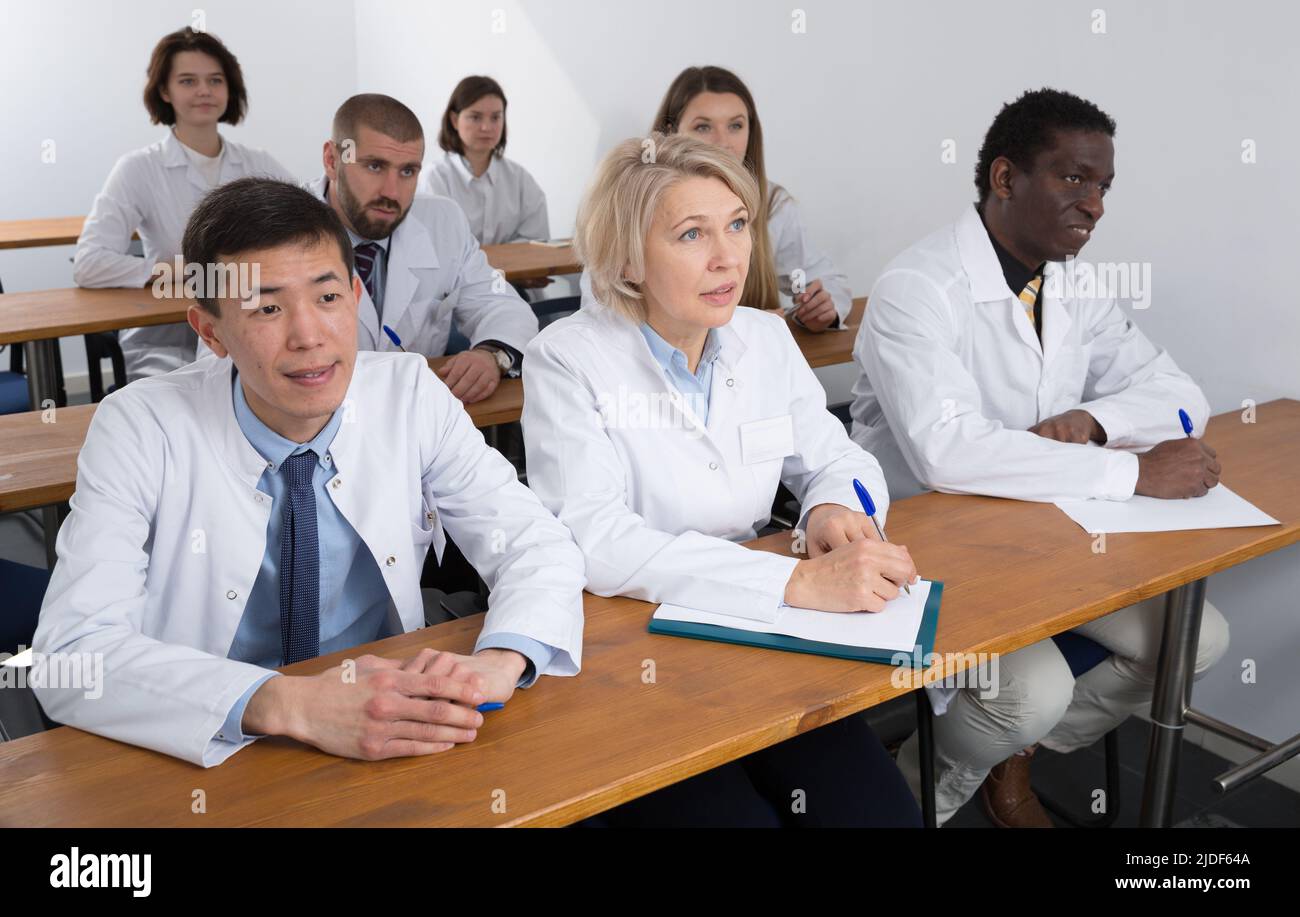 Group of physicians during seminar Stock Photo