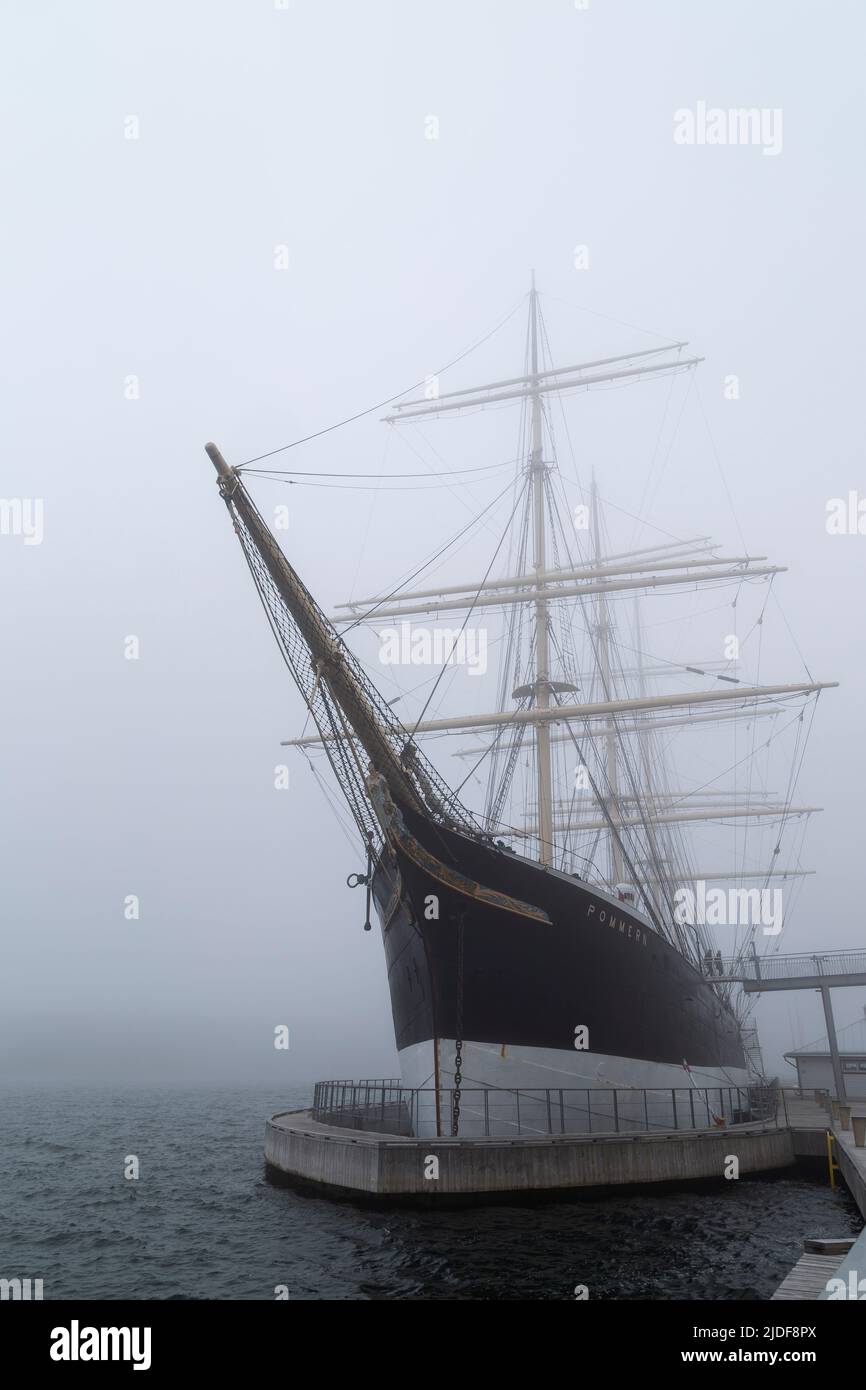 Historic museum ship Pommern moored at harbour in Mariehamn, Åland Islands, Finland, on a foggy day. Stock Photo