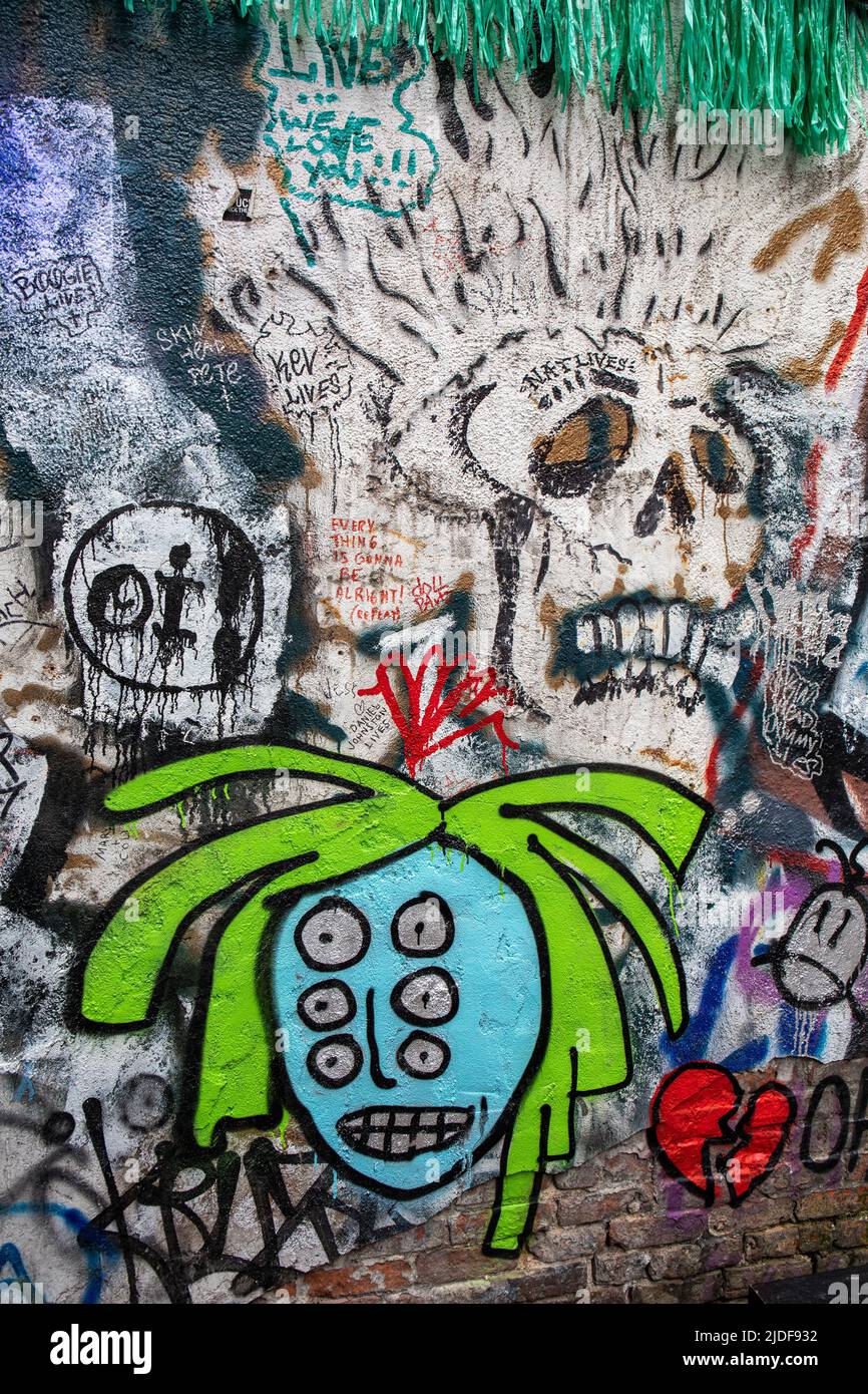 Graffiti on the wall of Double Down Saloon smoking patio in Alphabet City, New York City, United States of America Stock Photo