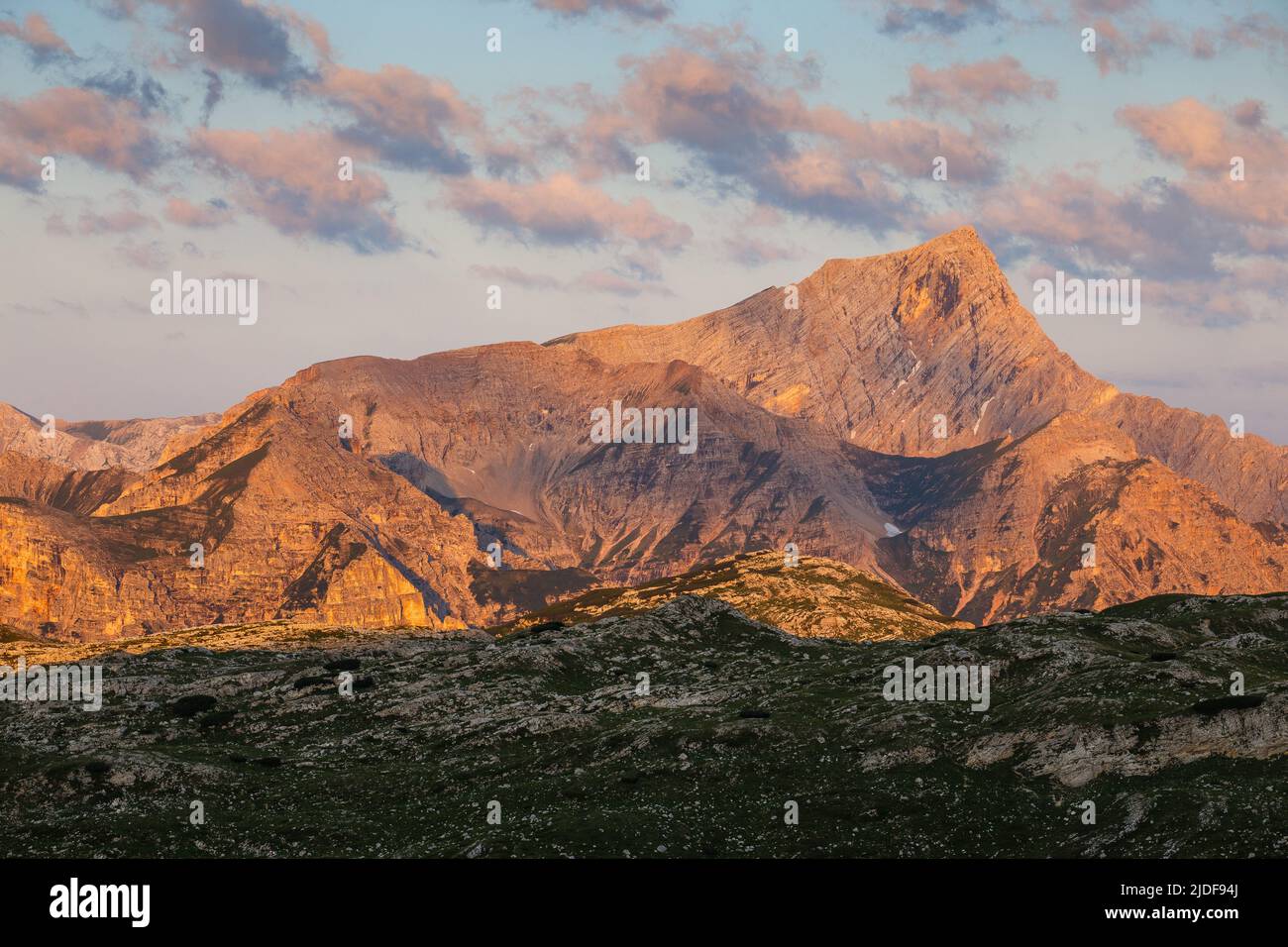 Sasso delle Nove mountain peak. Alpenglow at dawn. The Dolomites of Fanes-Senes-Braies Natural Park. Italian Alps. Europe. Stock Photo