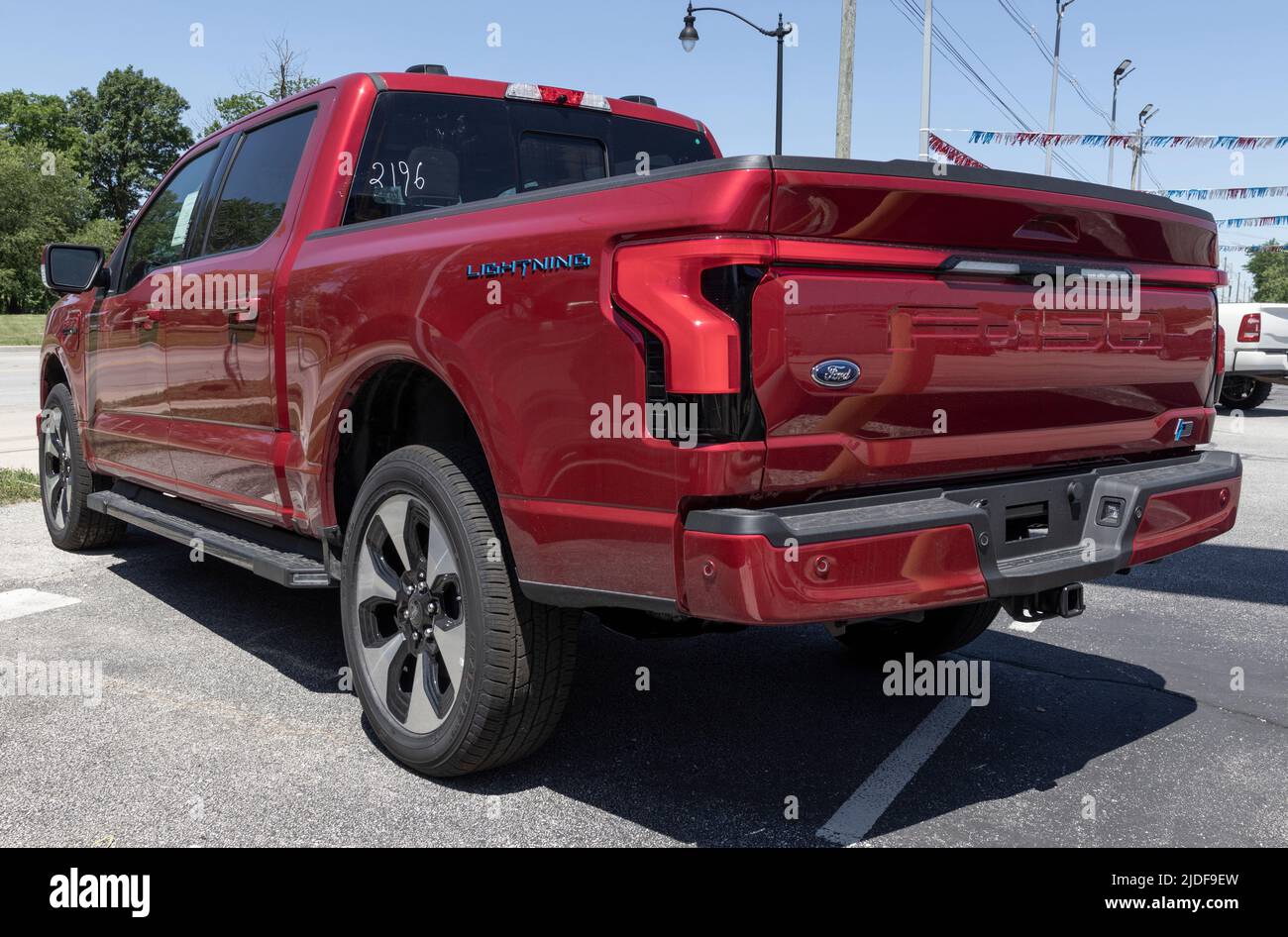 Lebanon - Circa June 2022: Ford F-150 Lightning display. Ford offers the F150 Lightning all-electric truck in Pro, XLT, Lariat, and Platinum models. Stock Photo