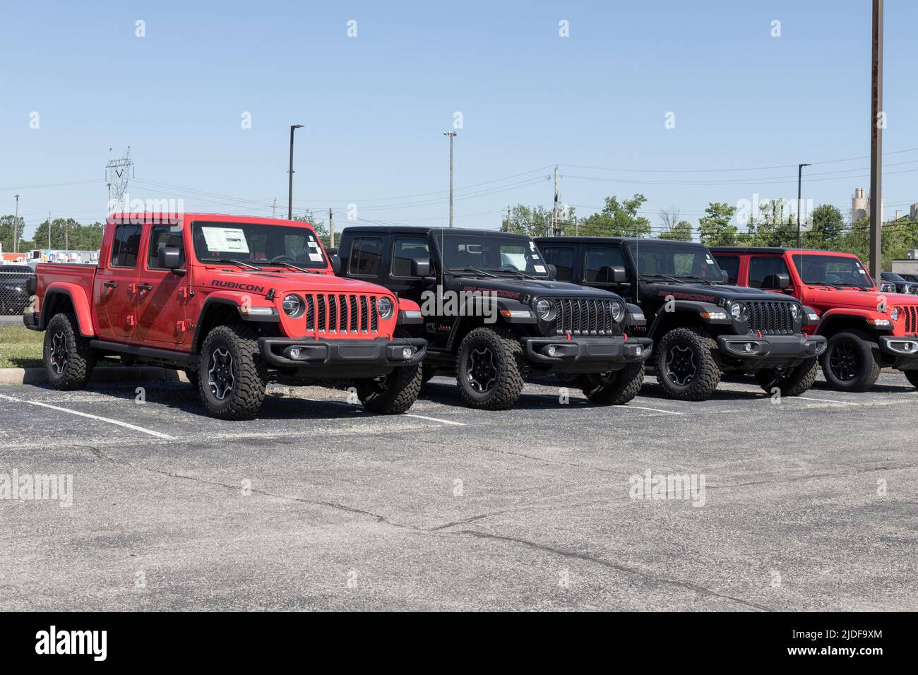 Indianapolis - Circa June 2022: Jeep Gladiator display at a Stellantis dealer. The Jeep Gladiator models include the Sport, Willys, Rubicon and Mojave Stock Photo