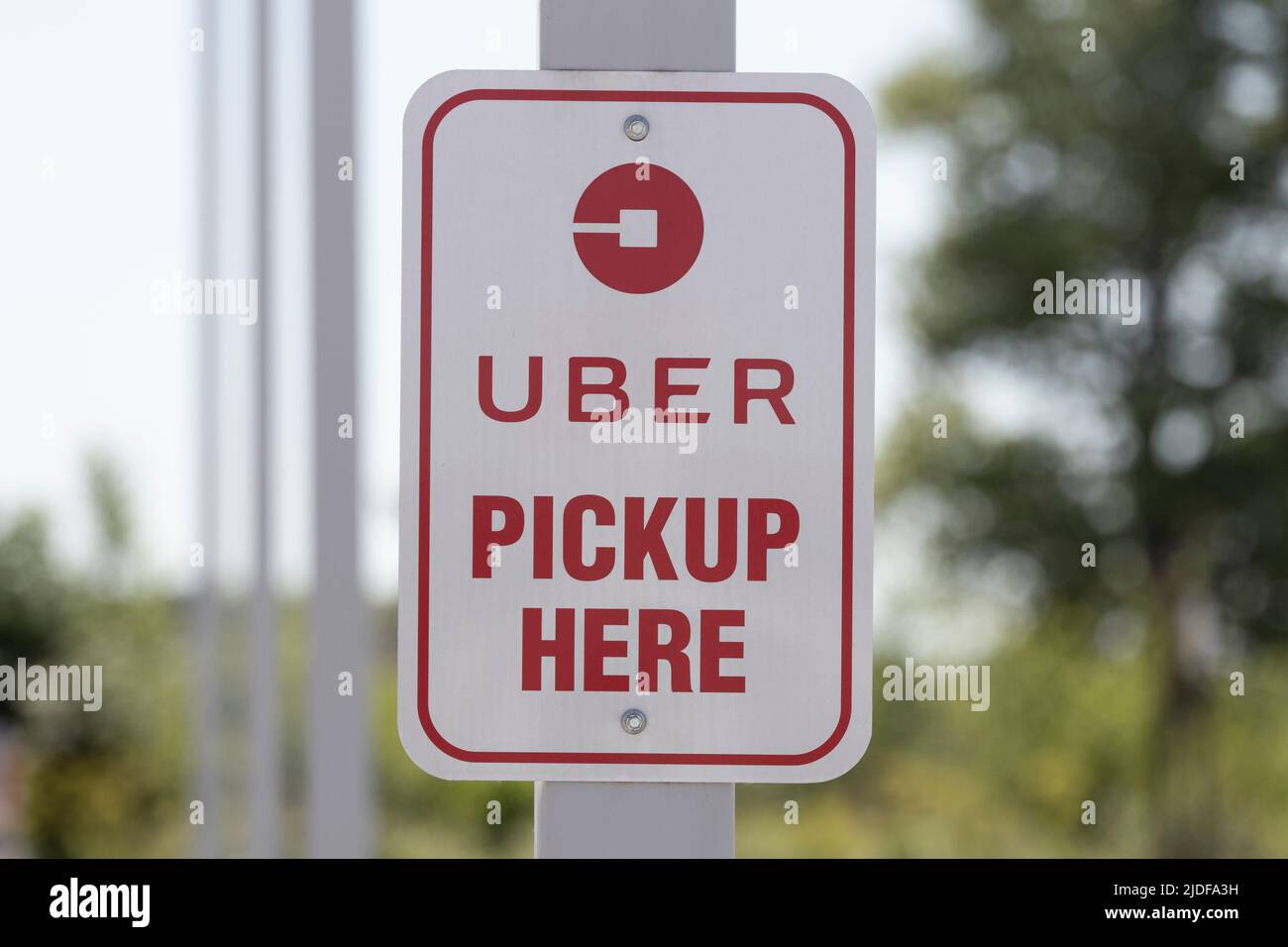 Whitestown - Circa June 2022: Uber pickup spot. Lyft and Uber have replaced many Taxi cabs for transportation. Stock Photo