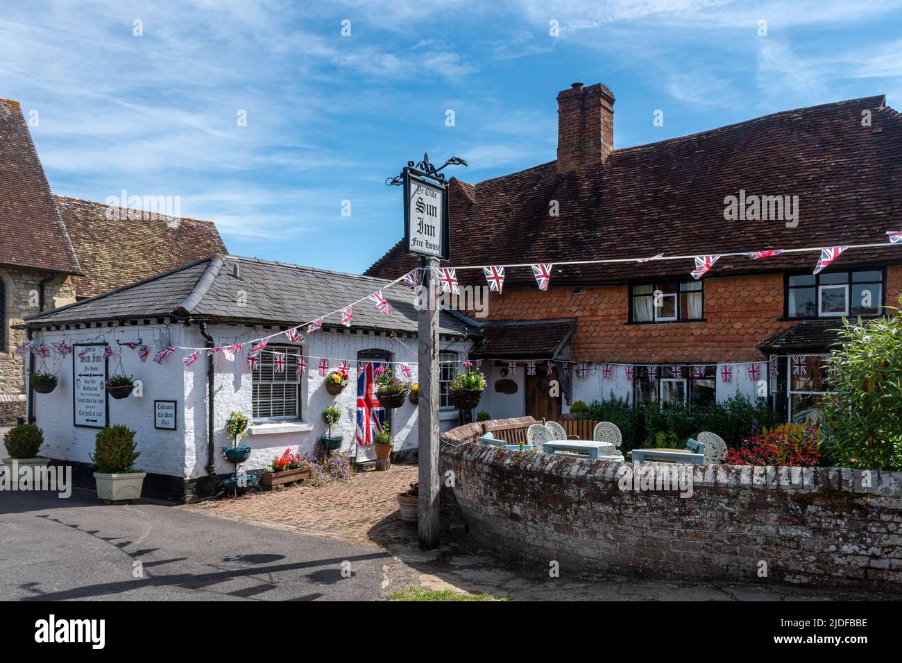 The Sun Inn, a pub in Plaistow village centre in West Sussex, England, UK Stock Photo