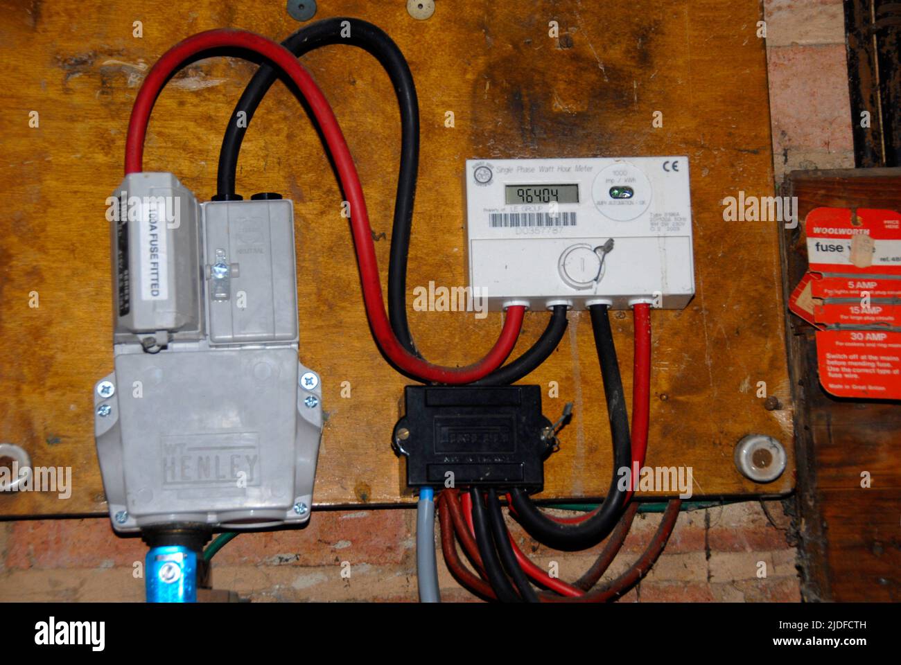 Electricity meter and ancillary equipment in domestic situation Stock Photo