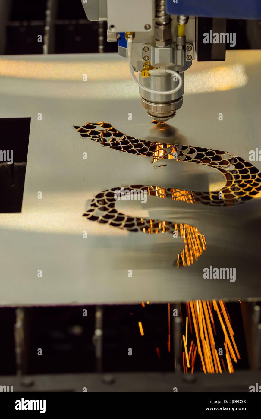 Laser burn holes hires stock photography and images Alamy