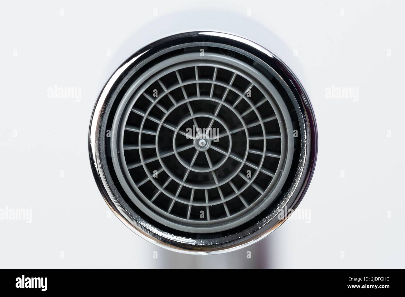 Plastic round aerator in faucet macro close up view Stock Photo