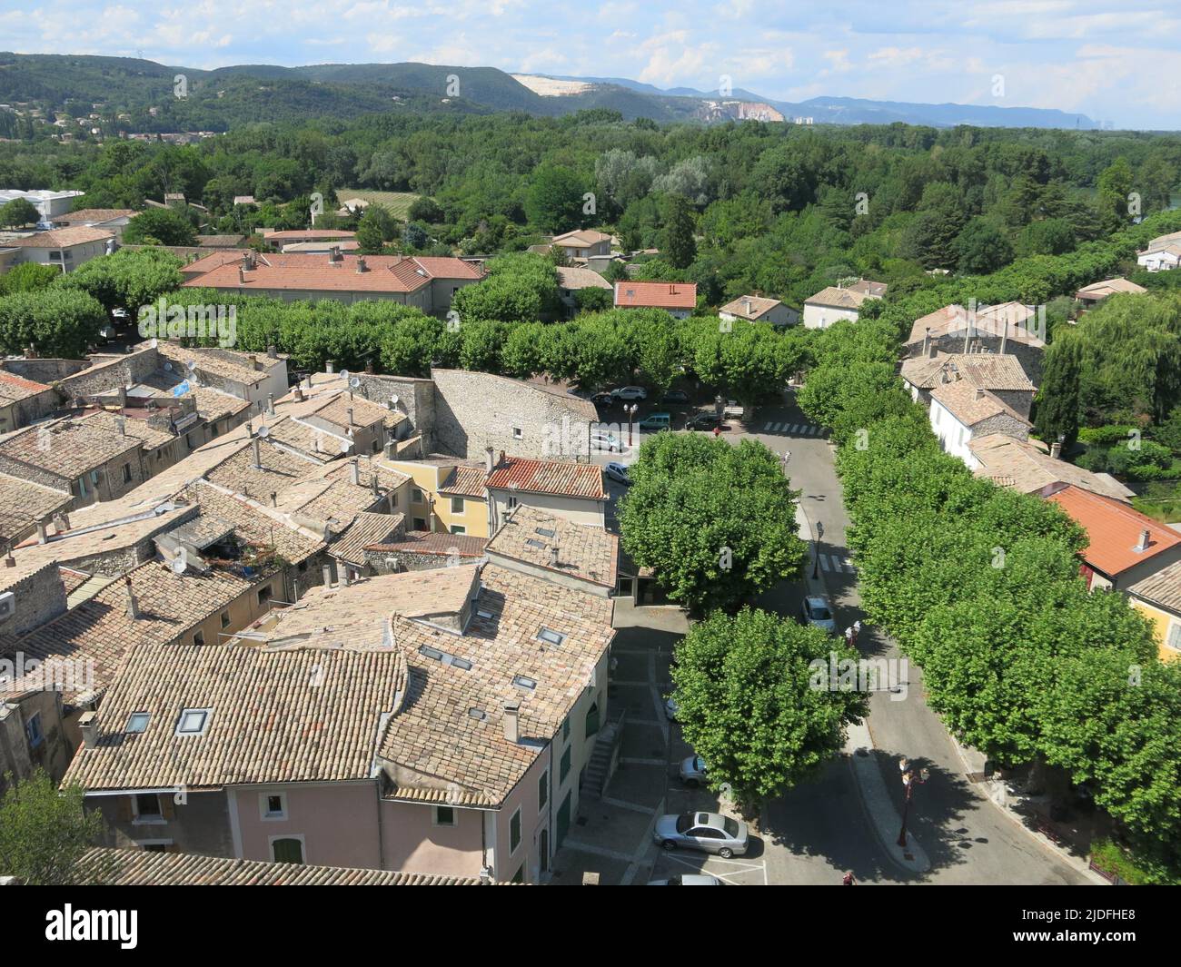 View from the observation deck, Point de Vue, over the rooftops of the old town of Viviers & surrounding countryside of the Ardeche, southern France. Stock Photo